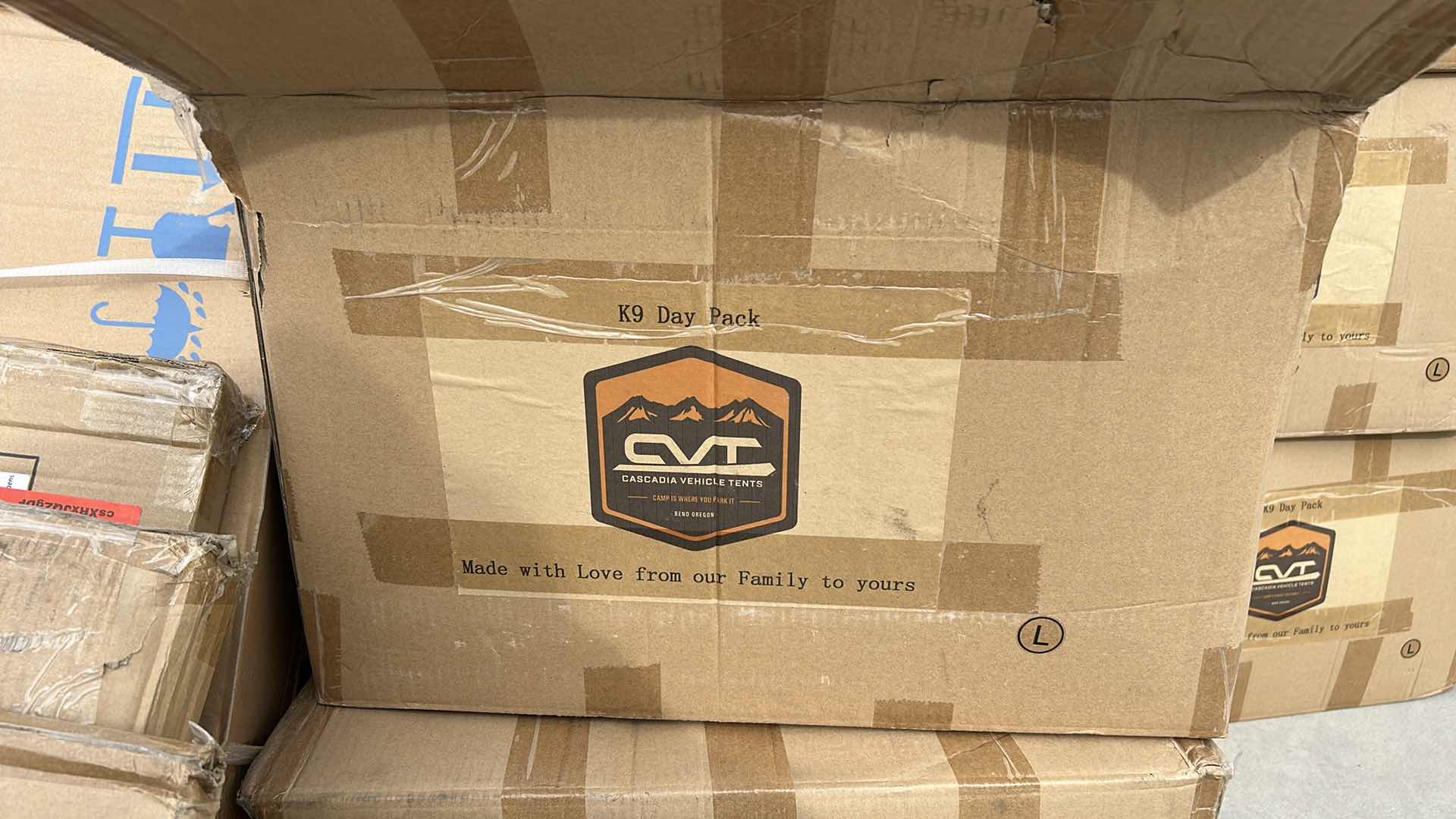 Photo 2 of LARGE BOX FULL OF NEW DOG HARNESSES AND SADDLEBAGS 