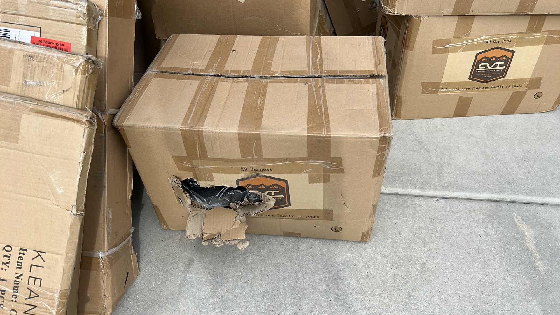 Photo 1 of LARGE BOX OF NEW DOG HARNESSES AND SADDLEBAGS 