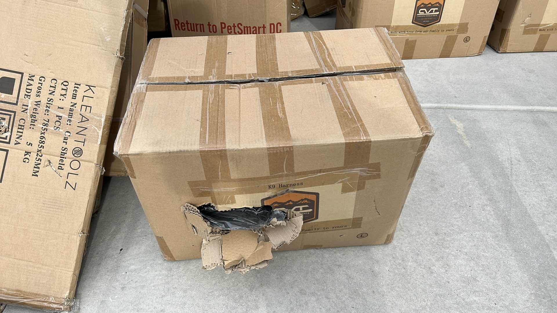 Photo 1 of LARGE BOX OF NEW DOG HARNESSES AND SADDLEBAGS 