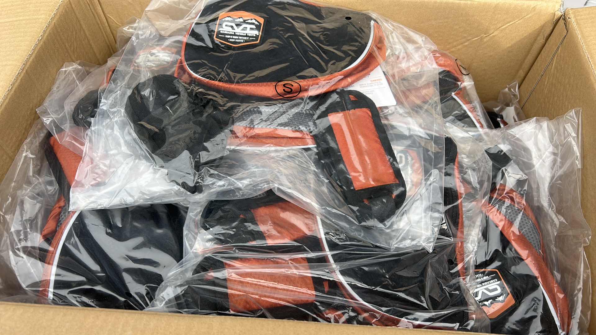 Photo 1 of LARGE BOX FULL OF NEW DOG HARNESSES AND SADDLEBAGS 