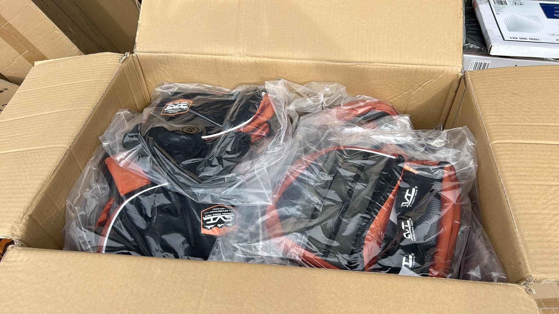 Photo 1 of LARGE BOX FULL OF NEW DOG HARNESSES AND SADDLEBAGS 