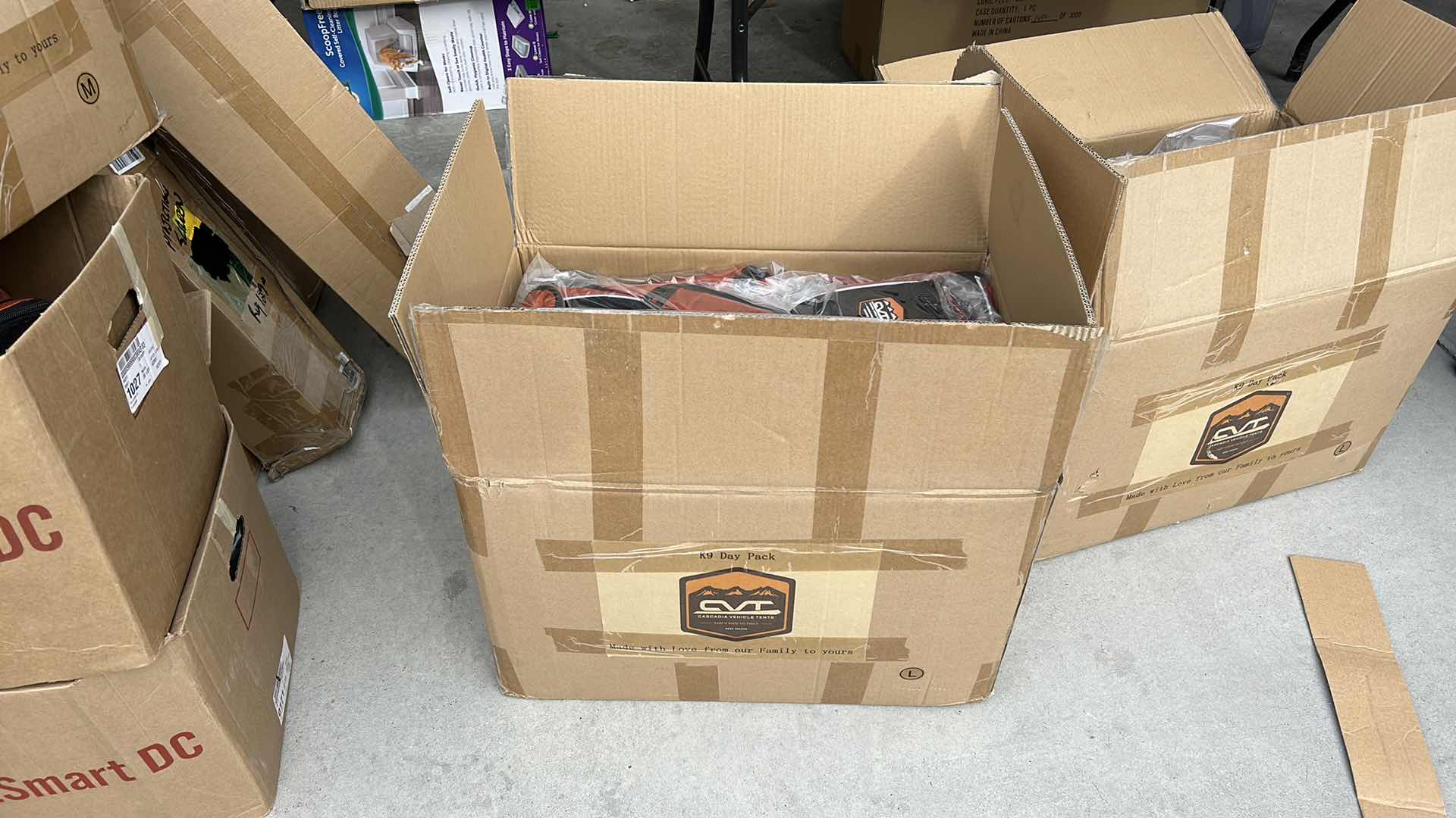 Photo 1 of LARGE BOX FULL OF NEW DOG HARNESSES AND SADDLEBAGS 