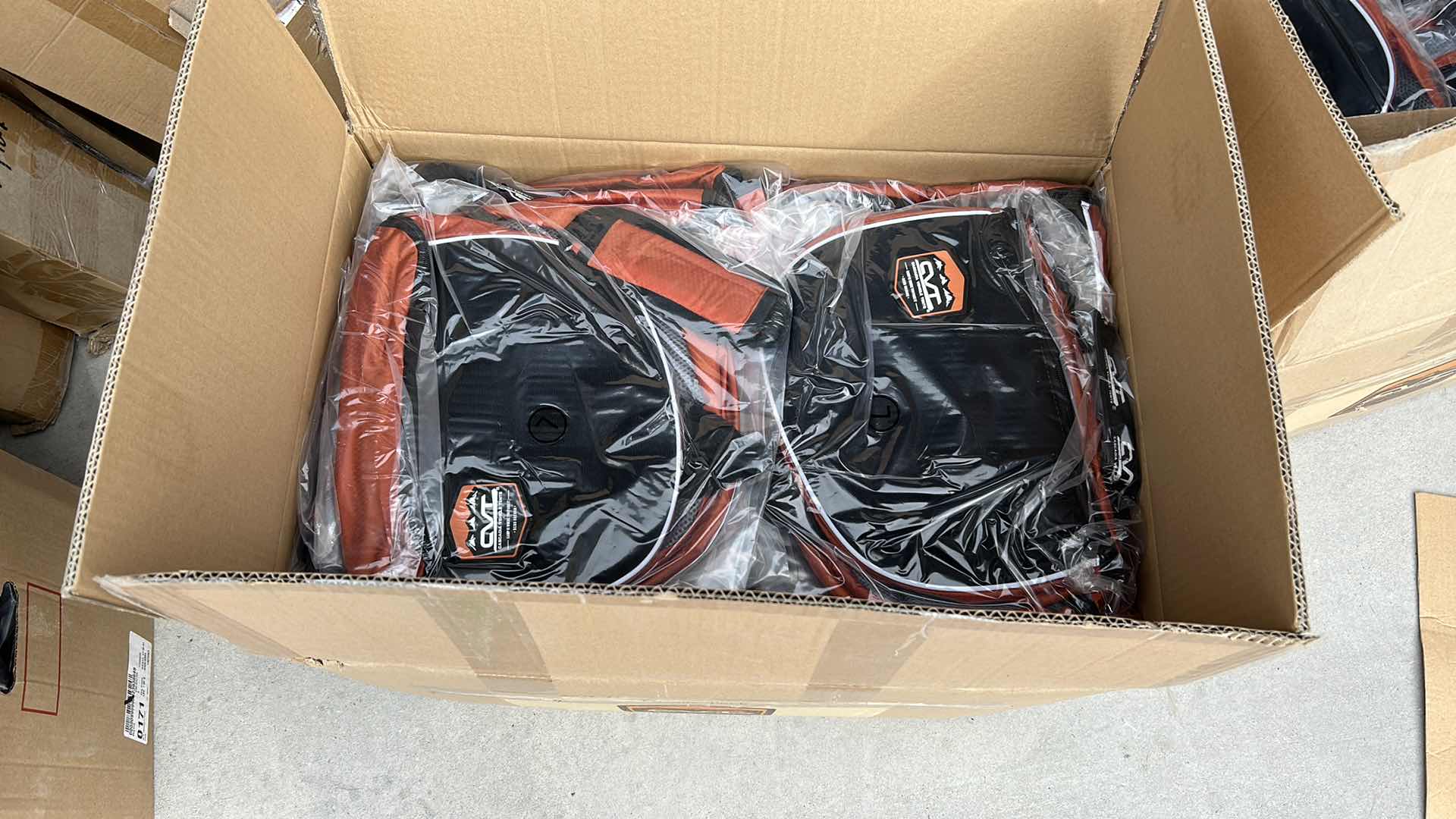 Photo 1 of LARGE BOX FULL OF NEW DOG HARNESSES AND SADDLEBAGS 