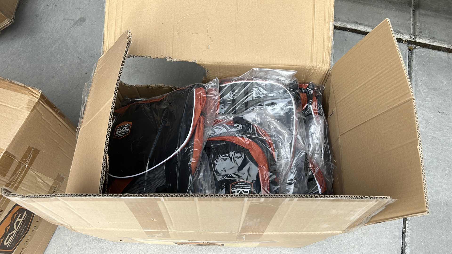 Photo 1 of LARGE BOX FULL OF NEW DOG HARNESSES AND SADDLEBAGS 