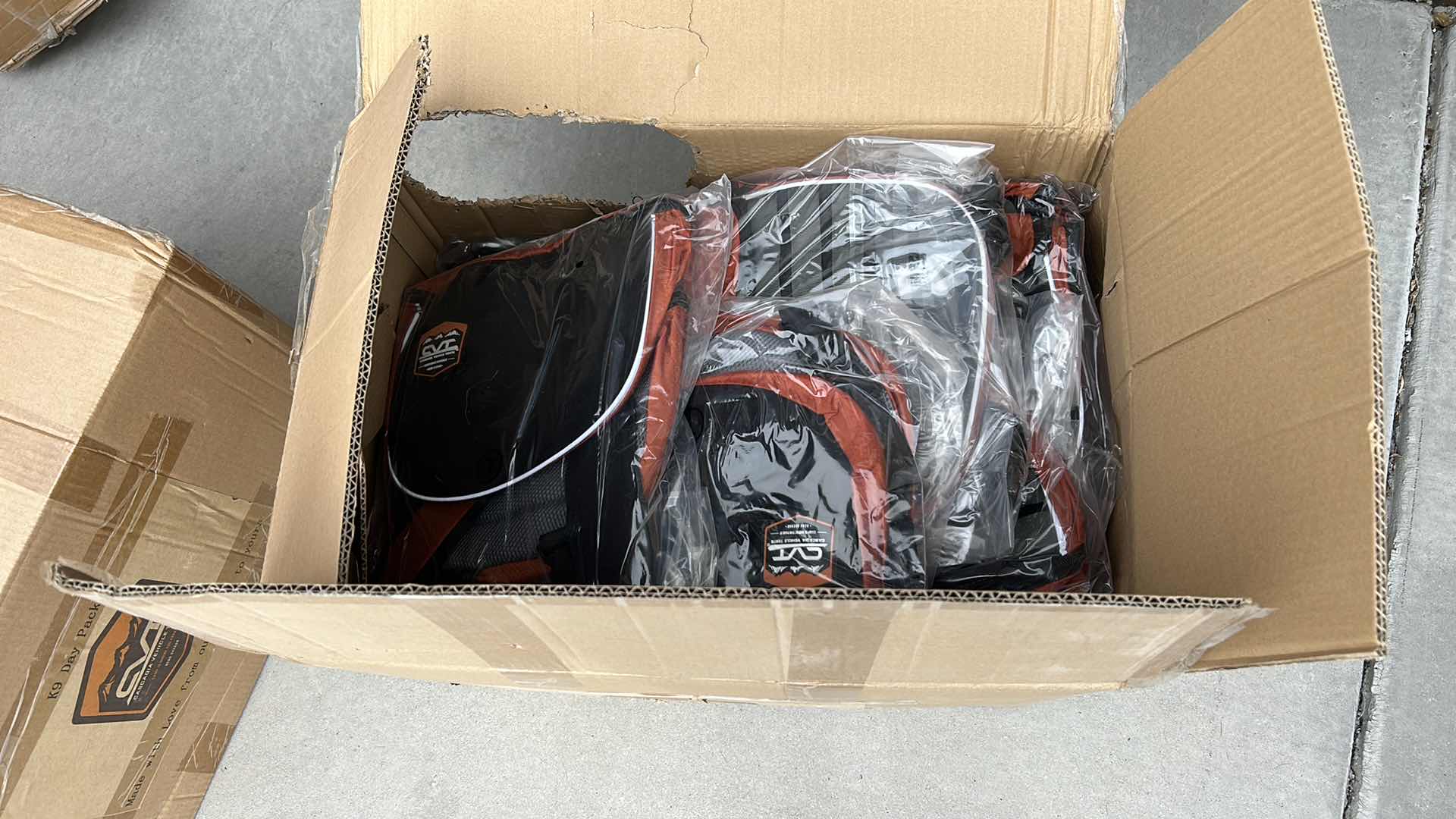 Photo 1 of LARGE BOX FULL OF NEW DOG HARNESSES AND SADDLEBAGS 