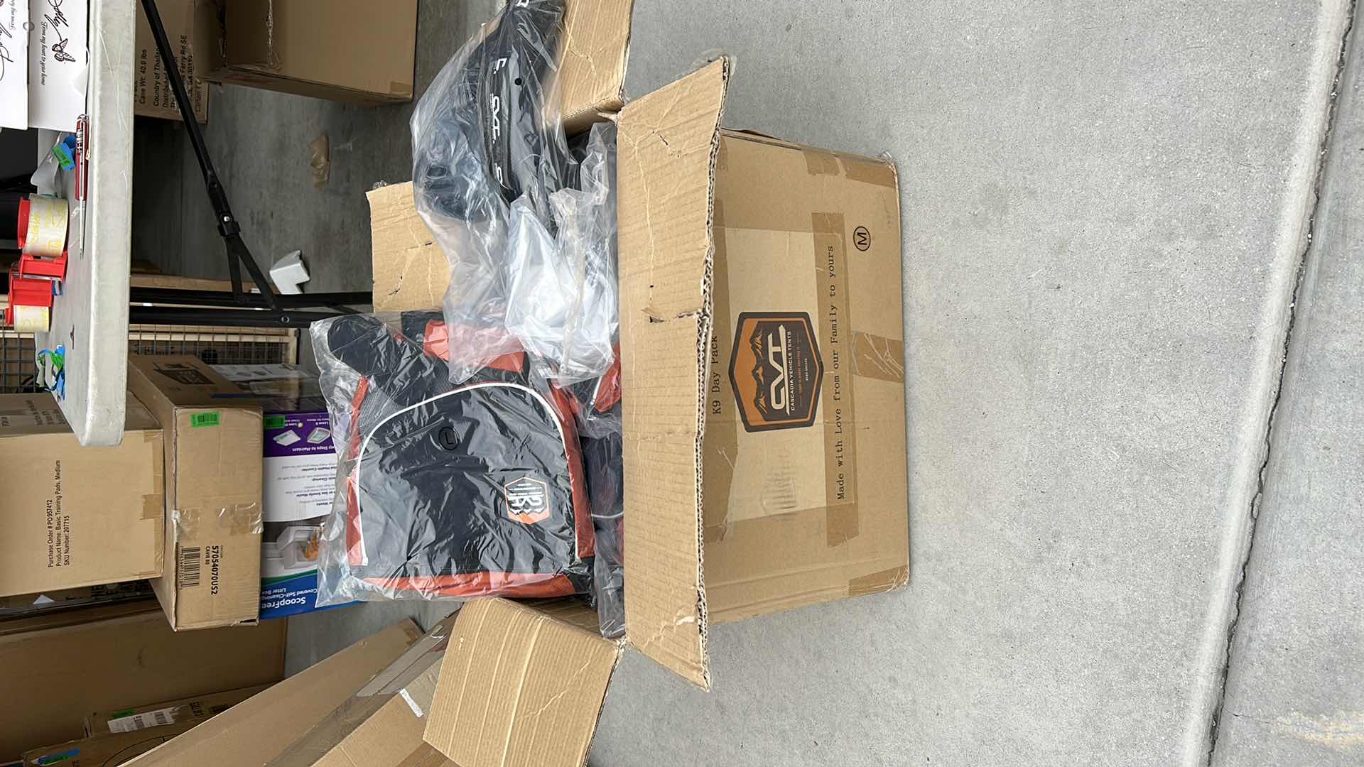 Photo 1 of LARGE BOX FULL OF NEW DOG HARNESSES AND SADDLEBAGS 