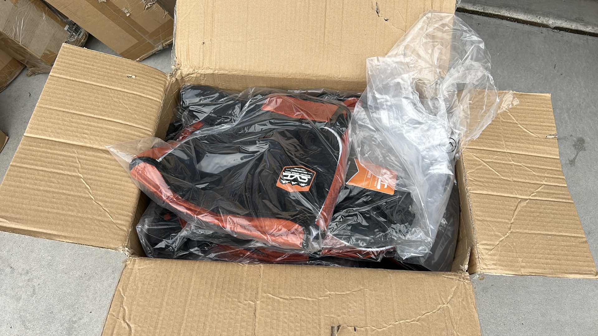 Photo 1 of LARGE BOX FULL OF NEW DOG HARNESSES AND SADDLEBAGS 