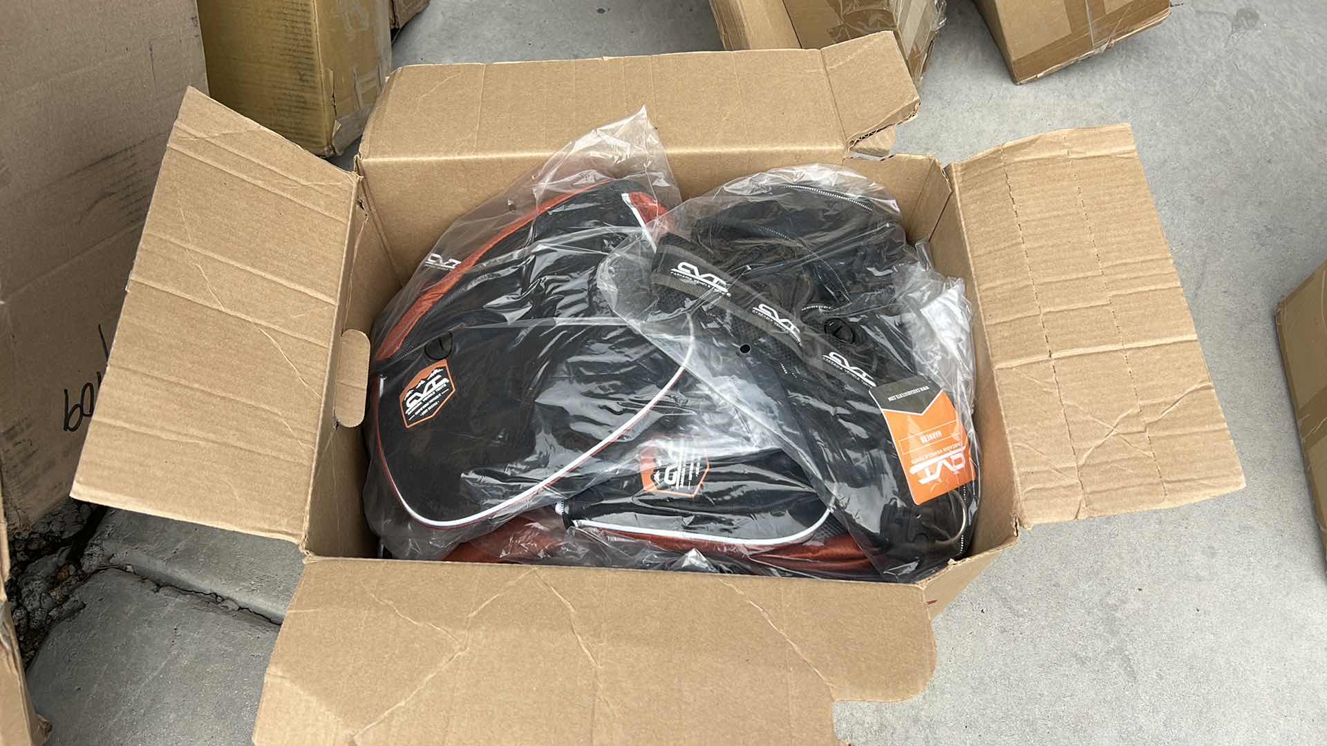 Photo 1 of LARGE BOX FULL OF NEW DOG HARNESSES AND SADDLEBAGS 