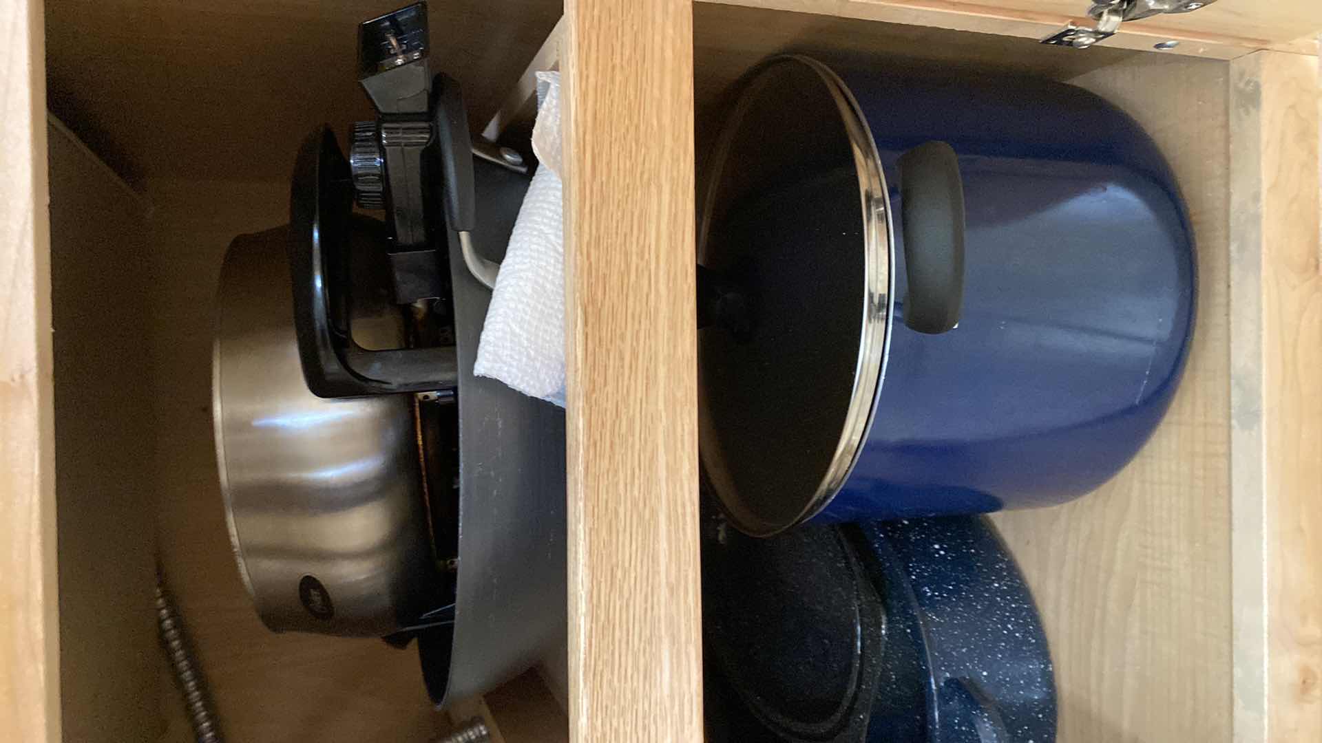 Photo 1 of CONTENTS OF KITCHEN CABINET POTS AND PANS