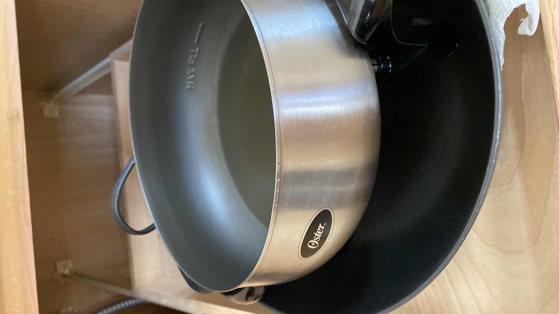 Photo 1 of CONTENTS OF KITCHEN CABINET POTS AND PANS