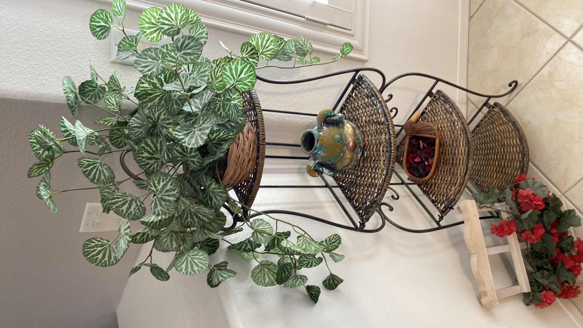 Photo 1 of CORNER METAL WITH WIVEN SHELVES STORAGE STAND 11“ x 11“ H 50” AND HOME DECOR ITEMS