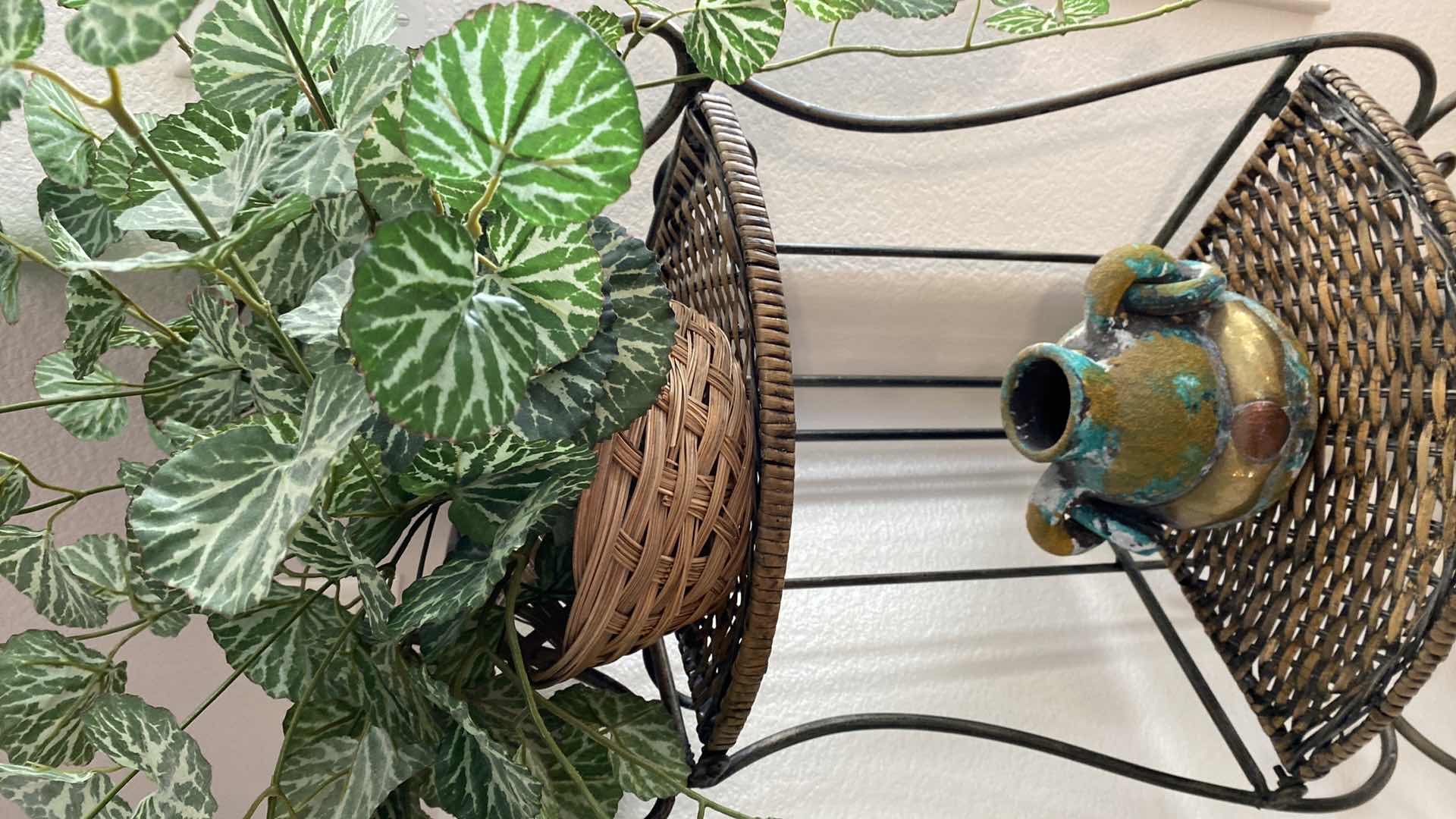 Photo 1 of CORNER METAL WITH WIVEN SHELVES STORAGE STAND 11“ x 11“ H 50” AND HOME DECOR ITEMS