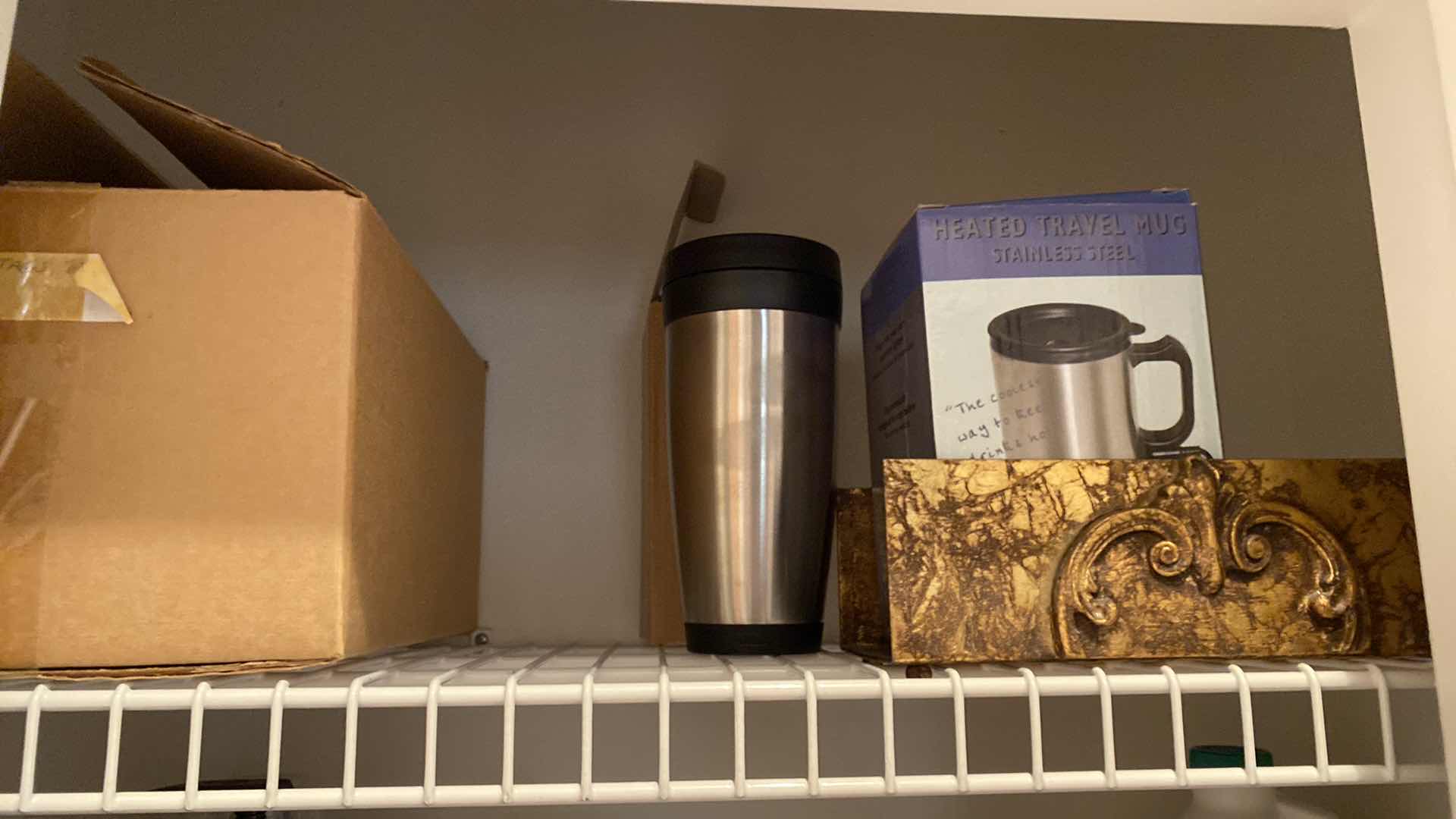 Photo 2 of HALL CLOSET ICE CHESTS CLEANING SUPPLIES NAPKINS AND MORE