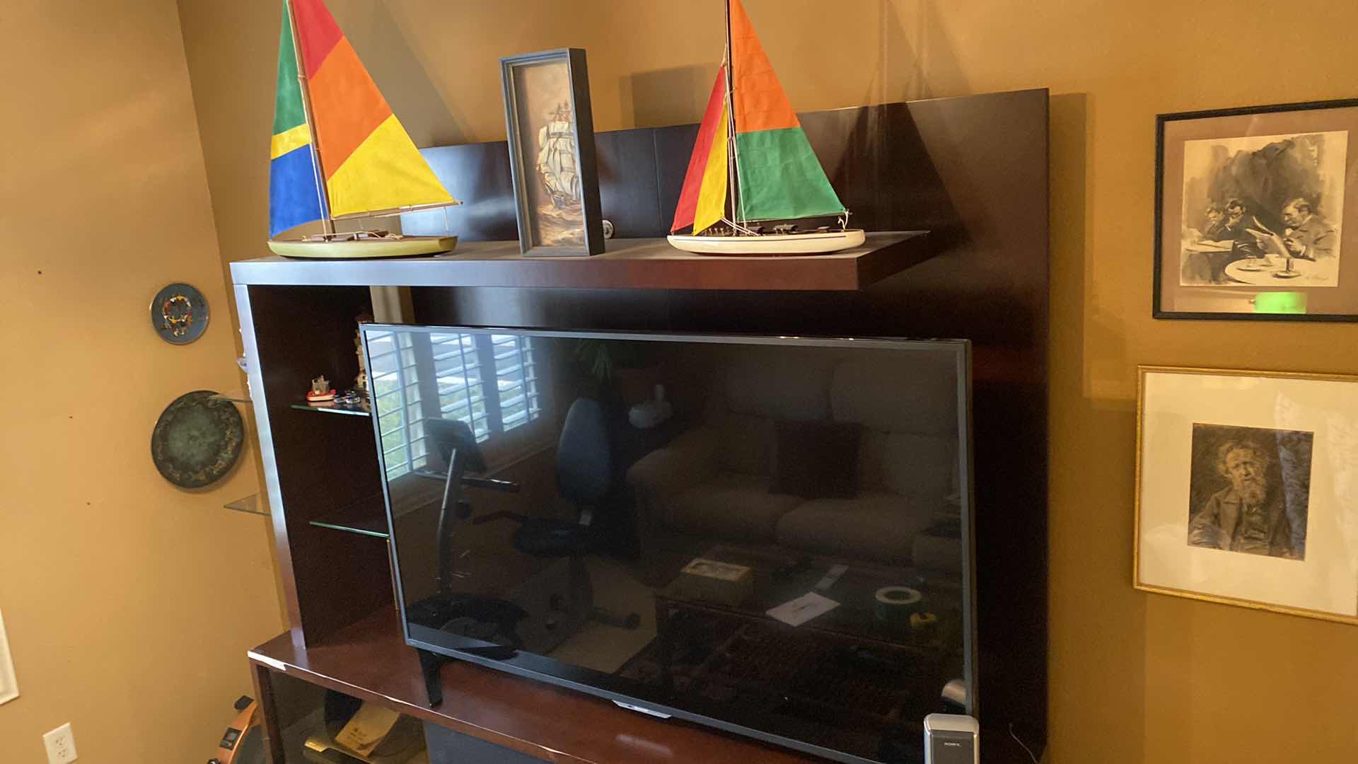 Photo 1 of ENTERTAINMENT CENTER 78“ x 19“ H80” LAMINATE PEELING AND CHIPPED, CONTENTS NOT INCLUDED
