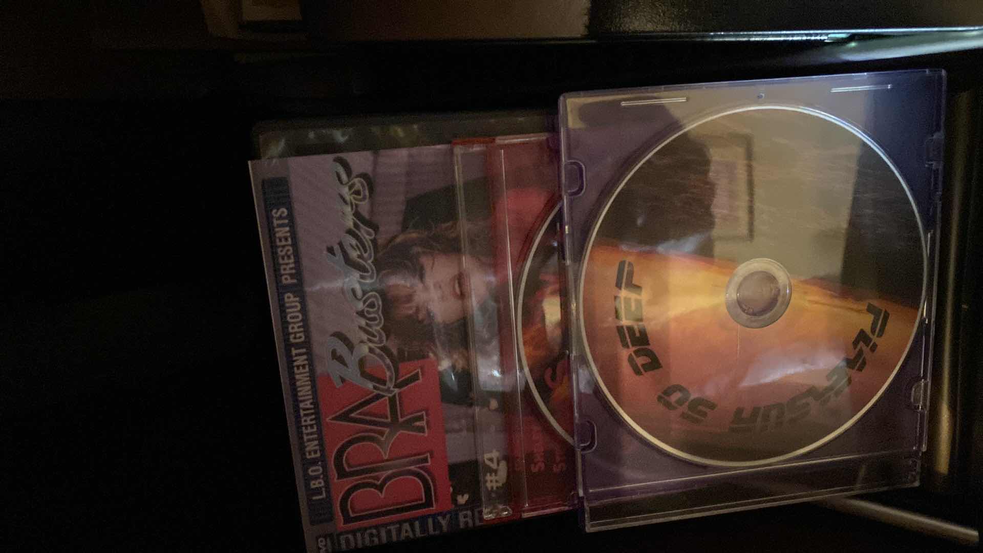 Photo 1 of ASSORTED VHS, DVDS