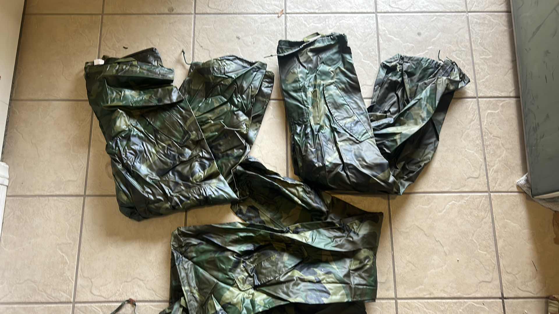 Photo 1 of MILITARY CAMO GEAR 1 JACKET, 3 PANTS AND 2 HATS