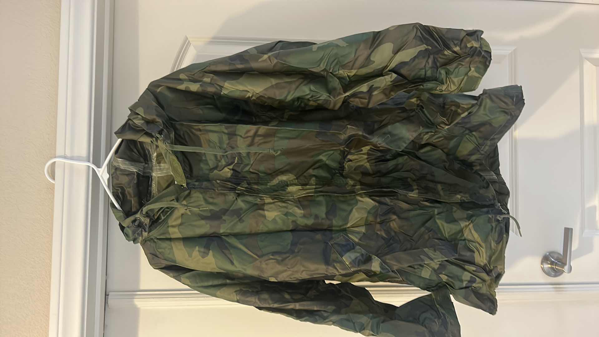 Photo 1 of MILITARY CAMO GEAR 1 JACKET, 3 PANTS AND 2 HATS