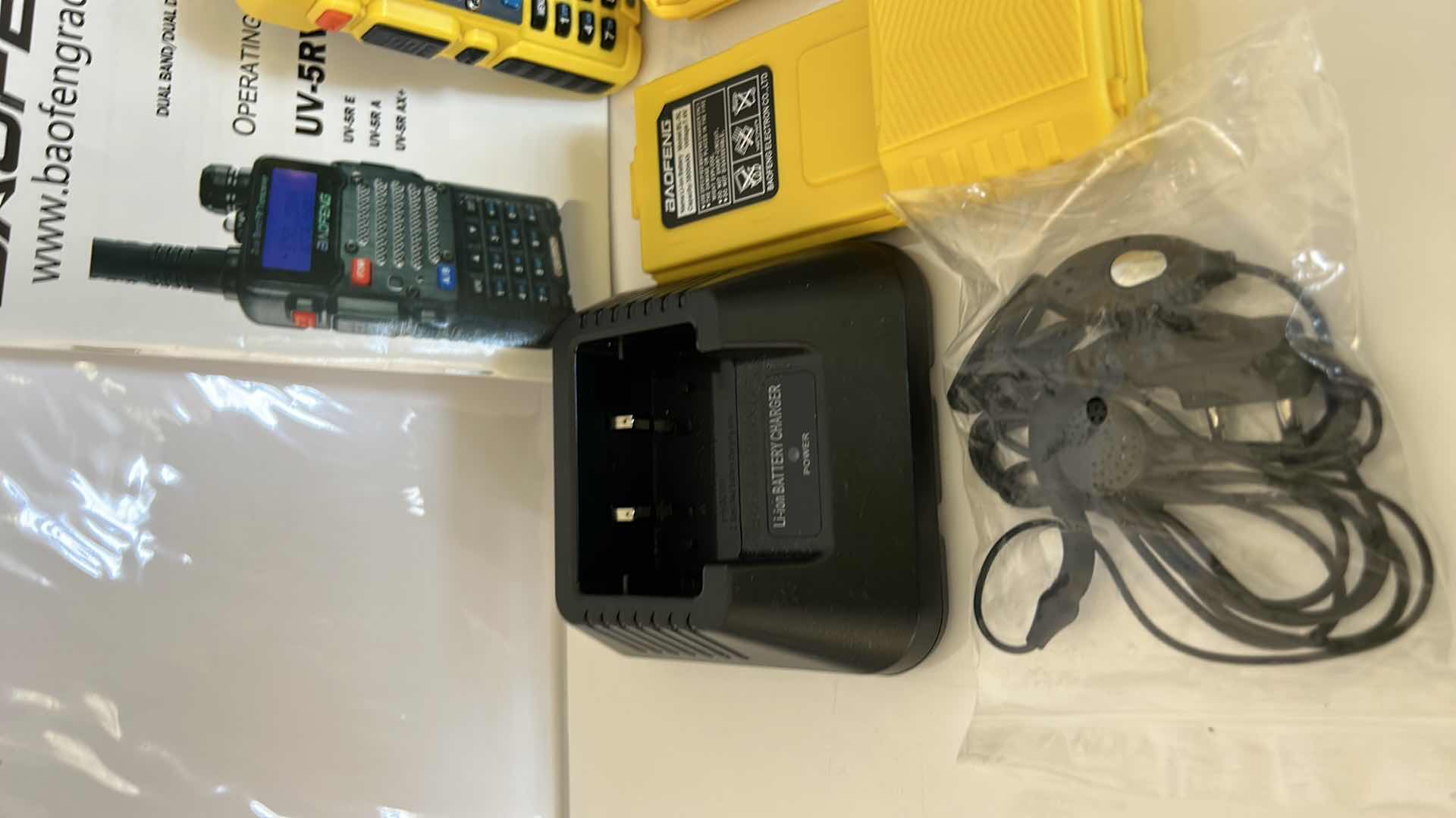 Photo 1 of BAOFENG DUAL BAND RADIO WITH ACCESSORIES