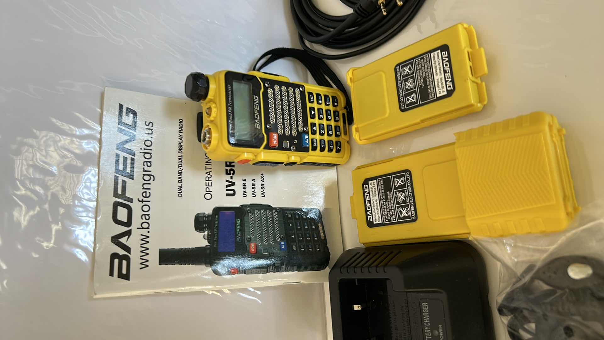 Photo 1 of BAOFENG DUAL BAND RADIO WITH ACCESSORIES