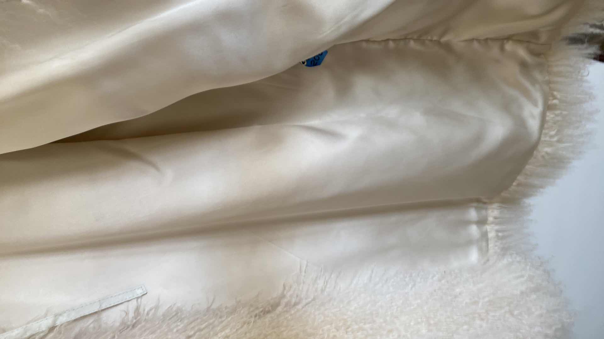 Photo 1 of LADIES MONGOLIAN COAT WITH SHORT SLEEVES (SIZE SM)