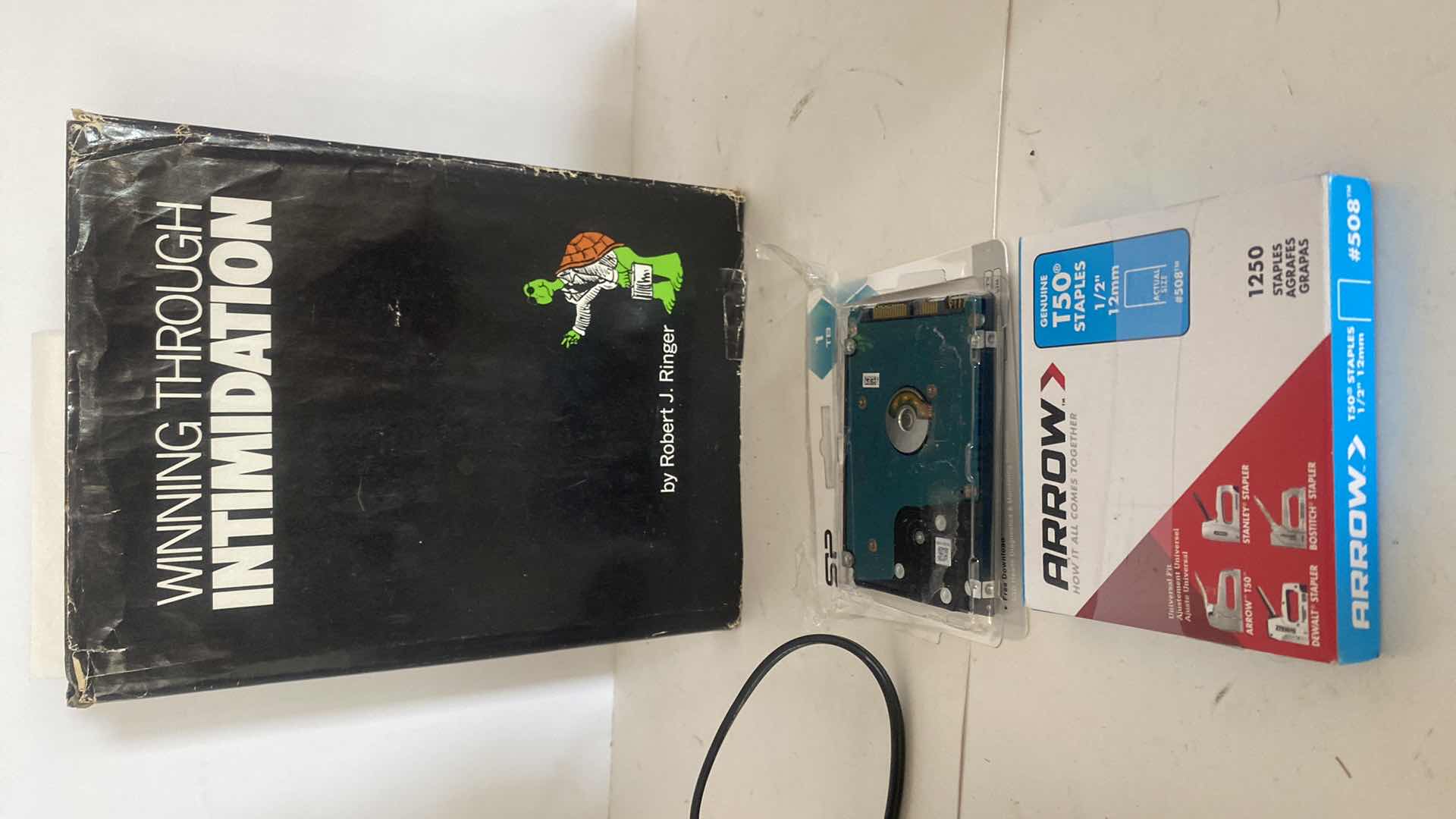 Photo 1 of WINNING THROUGH INTIMIDATION BOOK & OFFICE SUPPLIES - LABELER SHARPENER STAPLES