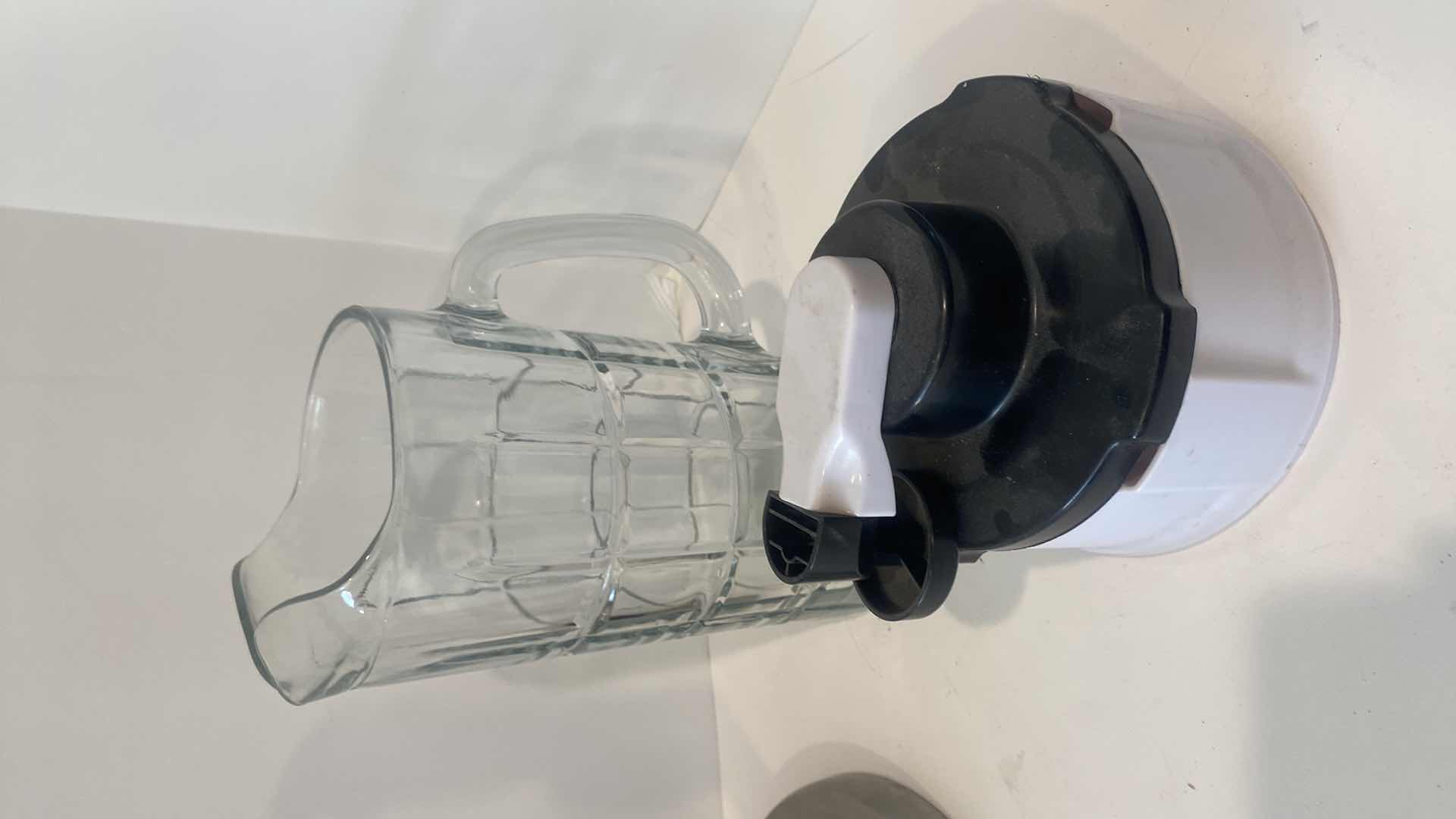 Photo 1 of PAPER TOWEL HOLDER CHOPPER & GLASS PITCHER & BOWLS