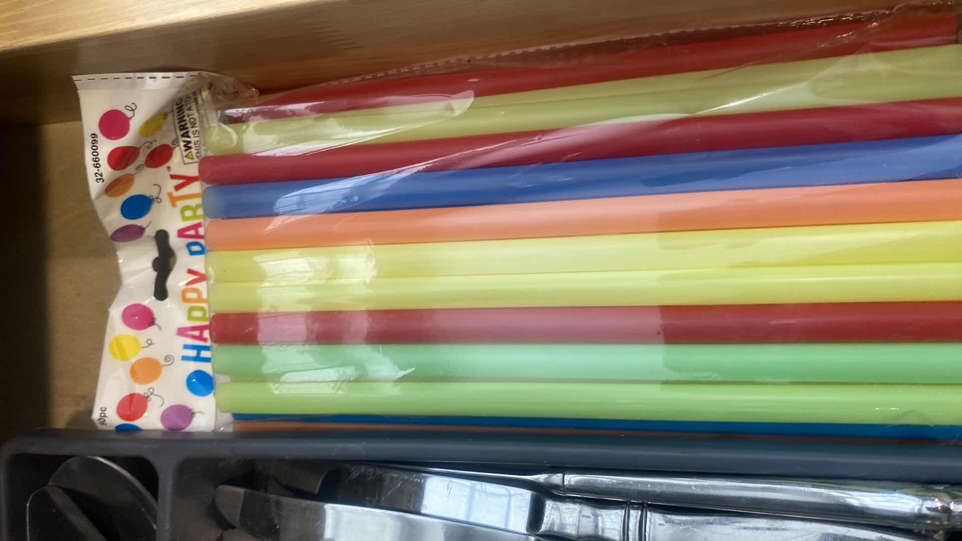 Photo 1 of CONTENTS KITCHEN CABINET-DRAWER WITH SILVERWARE & STRAWS