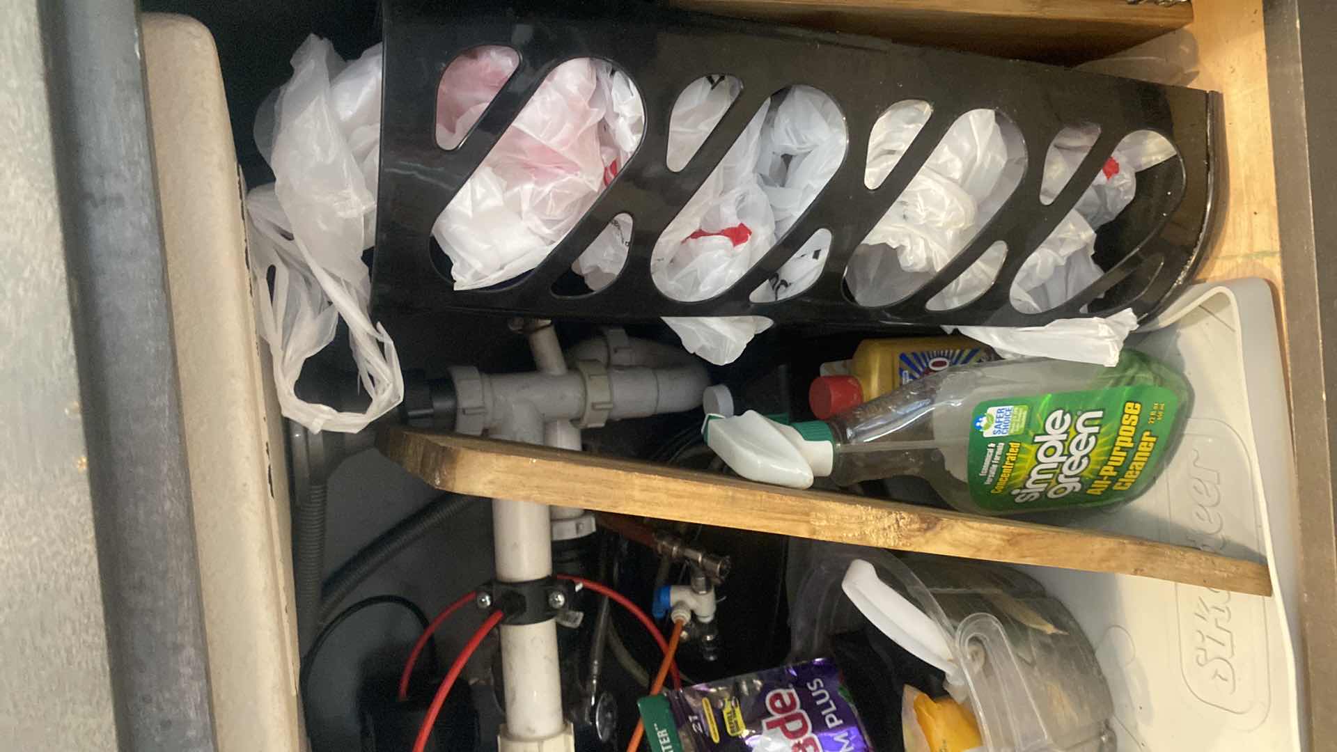 Photo 1 of CONTENTS KITCHEN CABINET-CLEANING SUPPLIES & BAGS