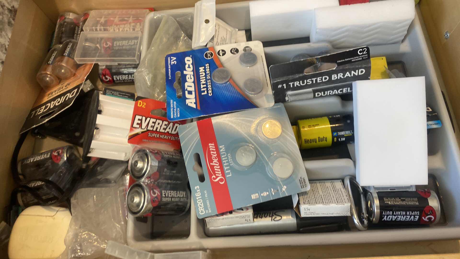 Photo 1 of CONTENTS KITCHEN CABINET-DRAWER WITH BATTERIES