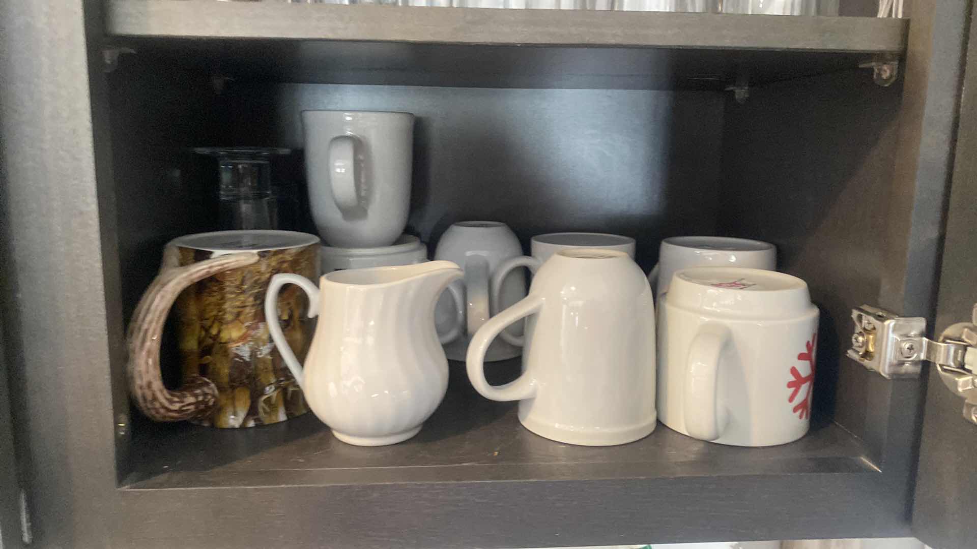 Photo 1 of CONTENTS KITCHEN CABINET-COFFEE CUPS & GLASSWARE