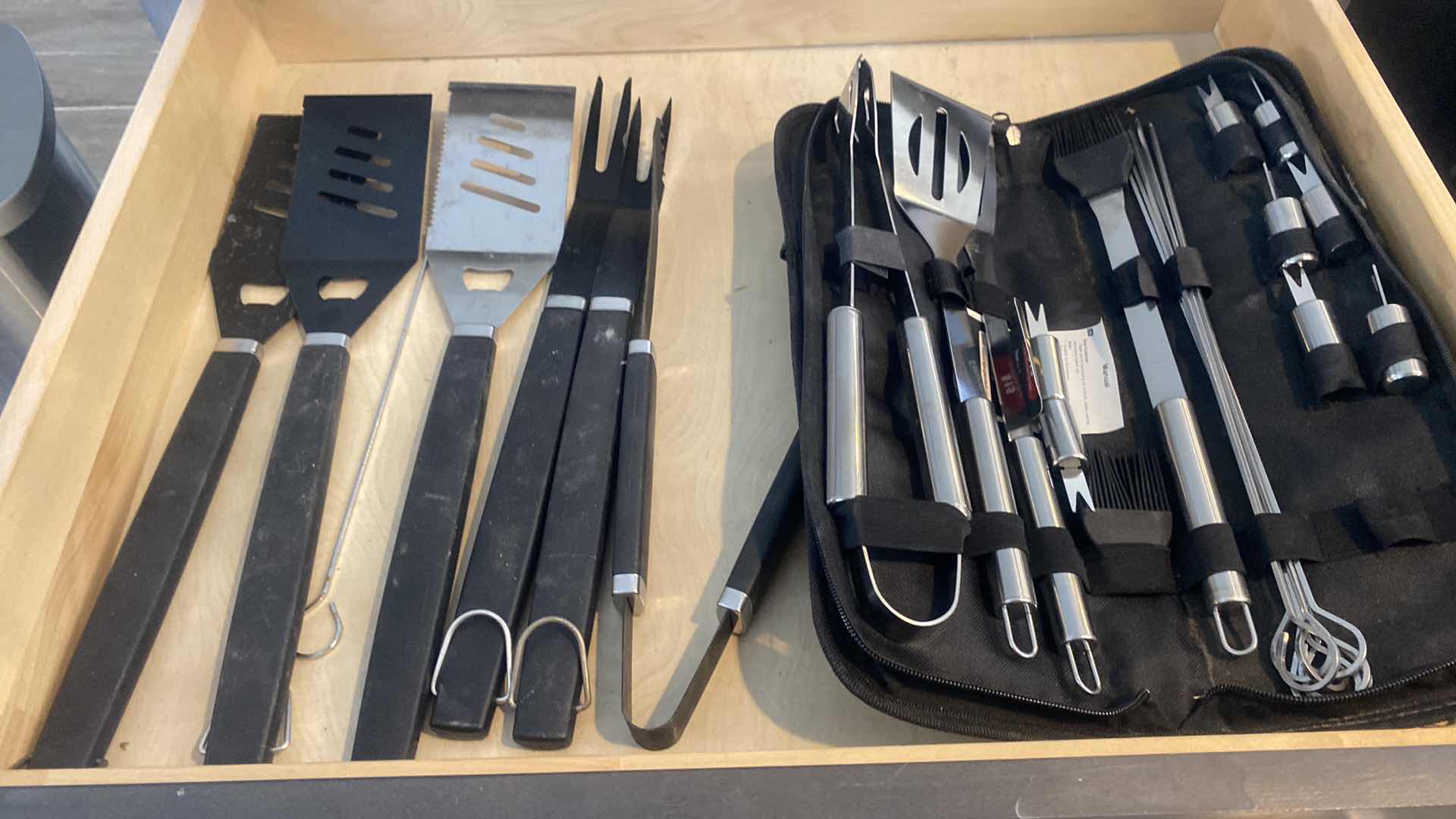 Photo 1 of CONTENTS KITCHEN CABINET-2 DRAWERS BBQ TOOLS