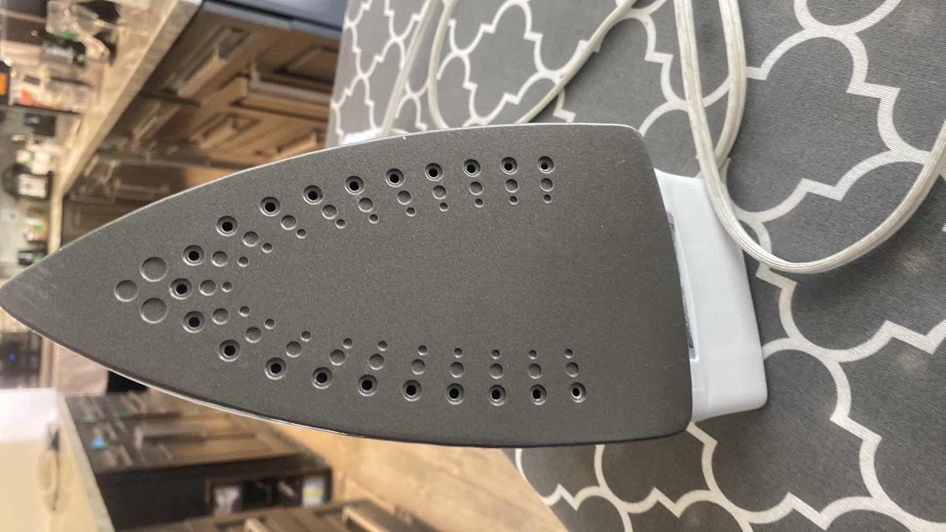 Photo 1 of IRONING BOARD AND BLACK &DECKER IRON