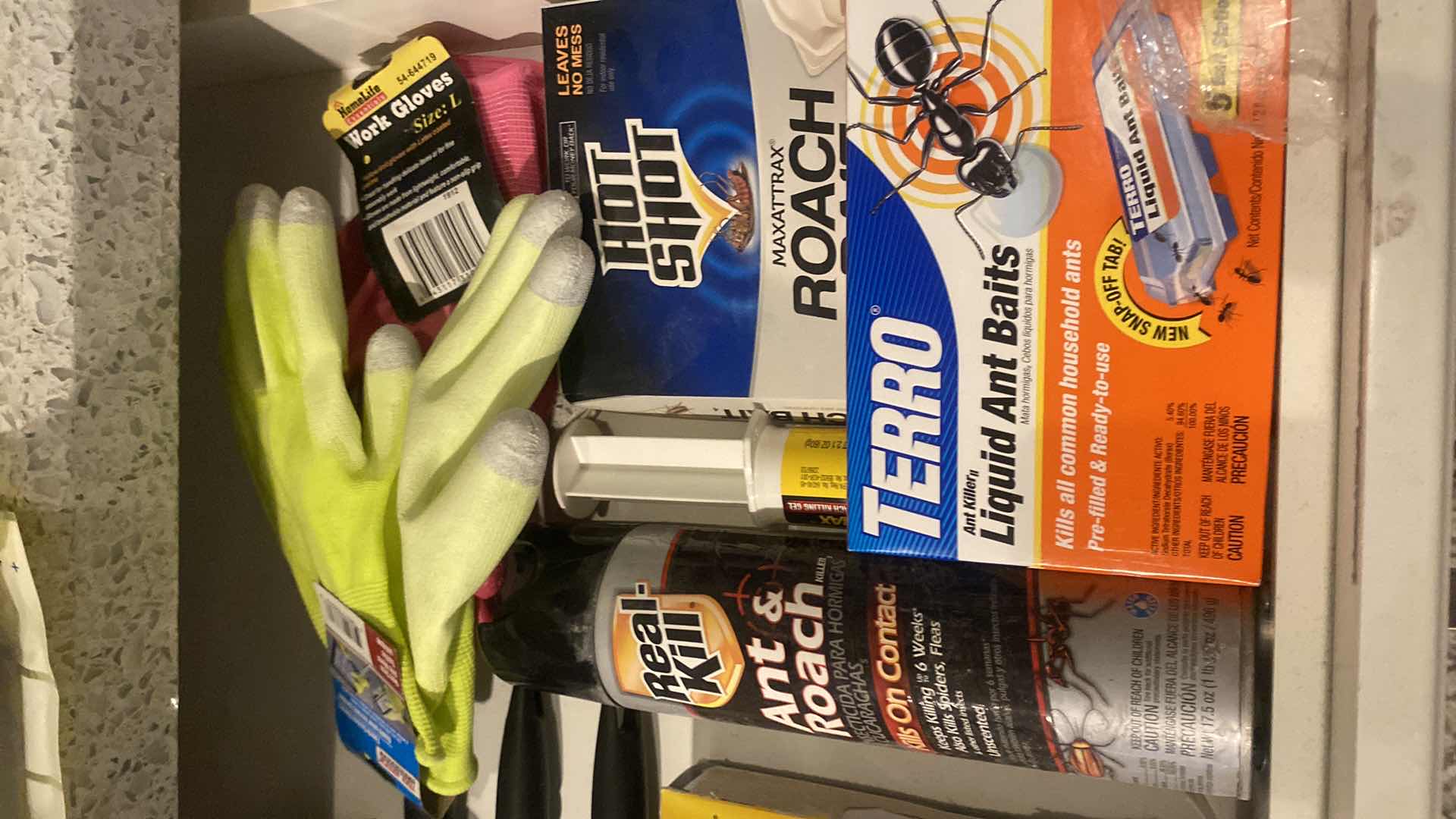Photo 1 of CONTENTS LAUNDRY ROOM DRAWER- BUG BAIT SPRAY & GLOVES & LINT ROLLERS
