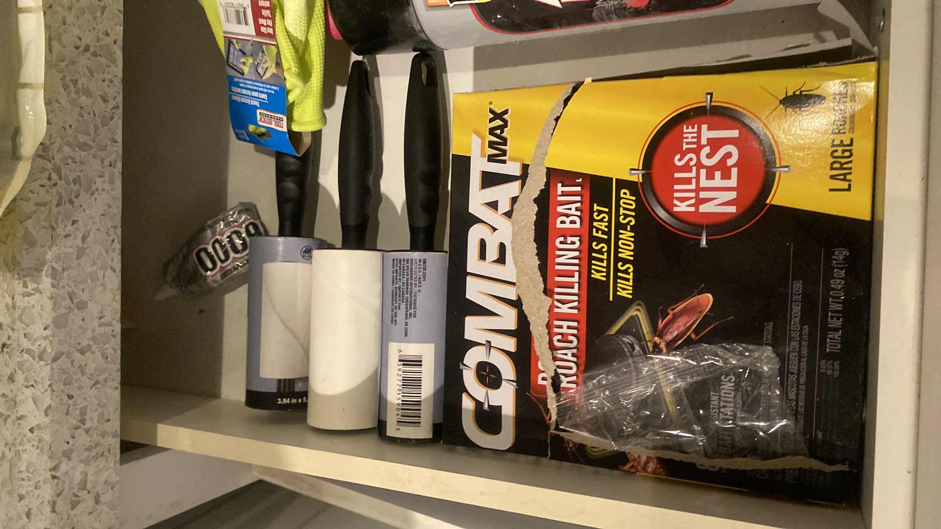 Photo 1 of CONTENTS LAUNDRY ROOM DRAWER- BUG BAIT SPRAY & GLOVES & LINT ROLLERS