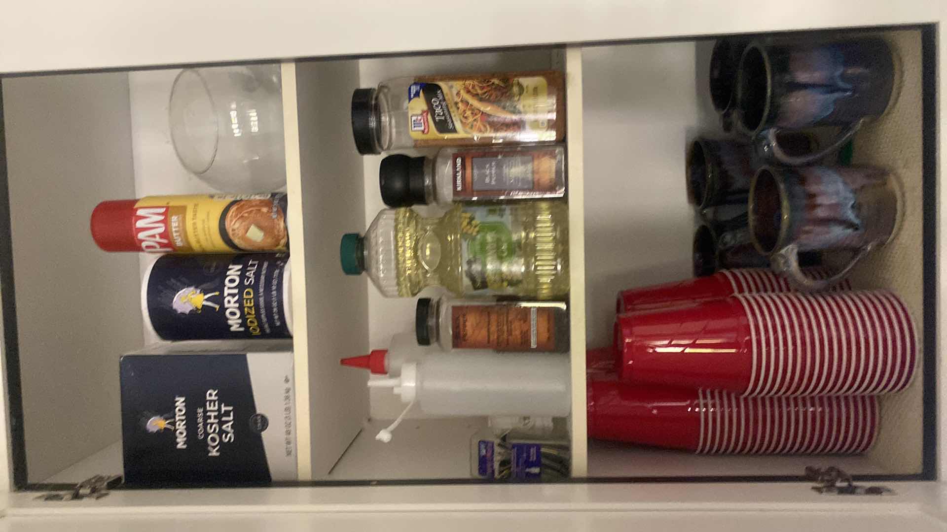 Photo 1 of CONTENTS OF KITCHEN CABINET - STARBUCKS CUPS COFFEE CUPS SPICES