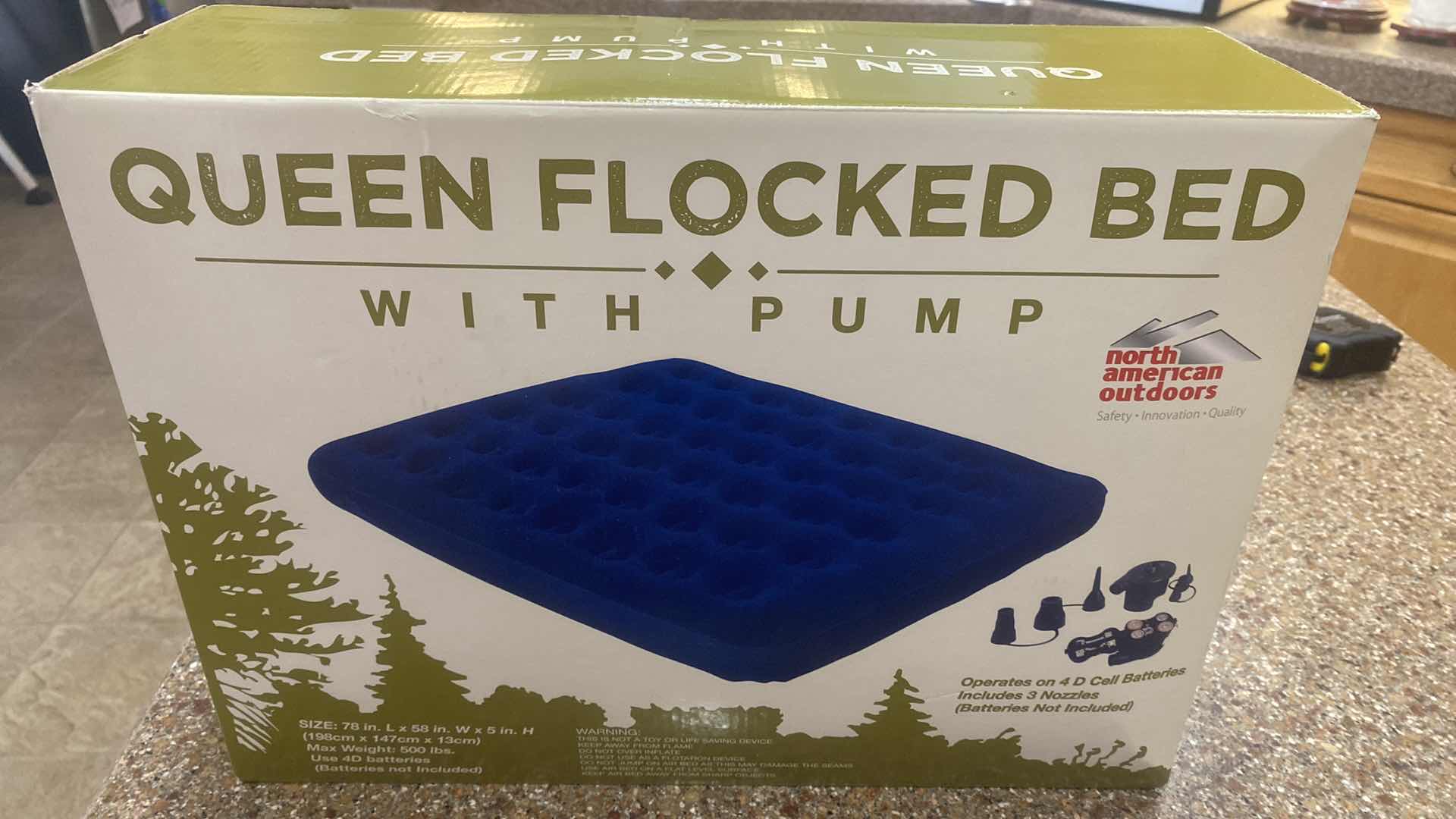 Photo 1 of NIB QUEEN FLOCKED BED