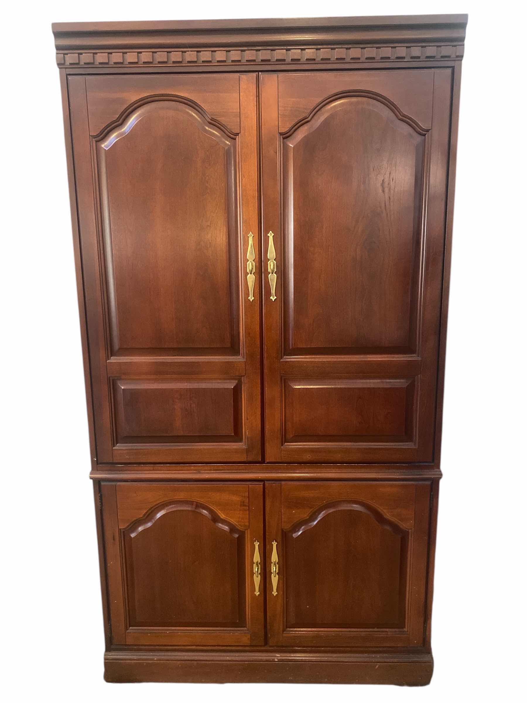 View 1 of TWO DOOR CHERRY ENTERTAINMENT CENTER EITH DENTAL TRIM 41” x 24” H77”