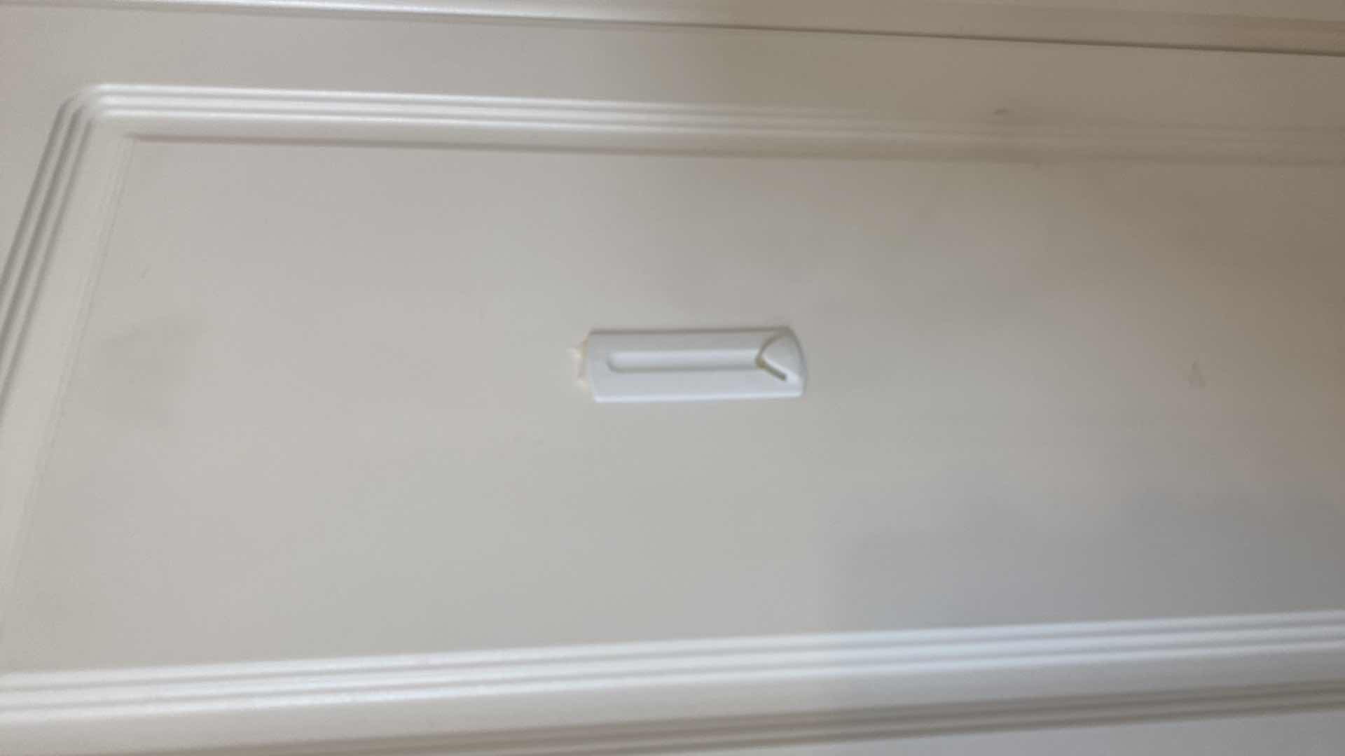 Photo 1 of WHITE TWO DOOR PRESSBOARD CABINET 30” x 15 1/2” H 72”