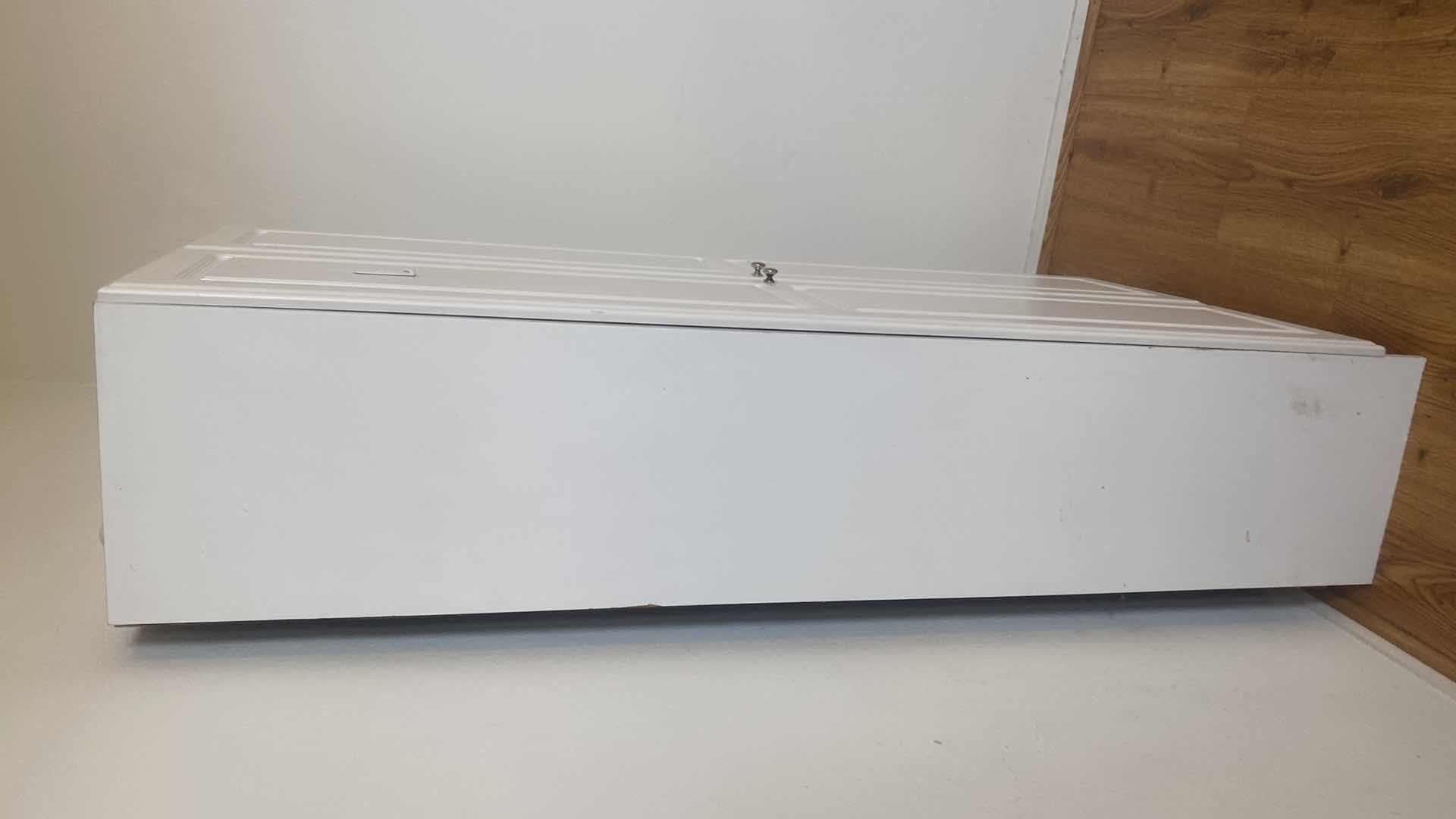 Photo 1 of WHITE TWO DOOR PRESSBOARD CABINET 30” x 15 1/2” H 72”