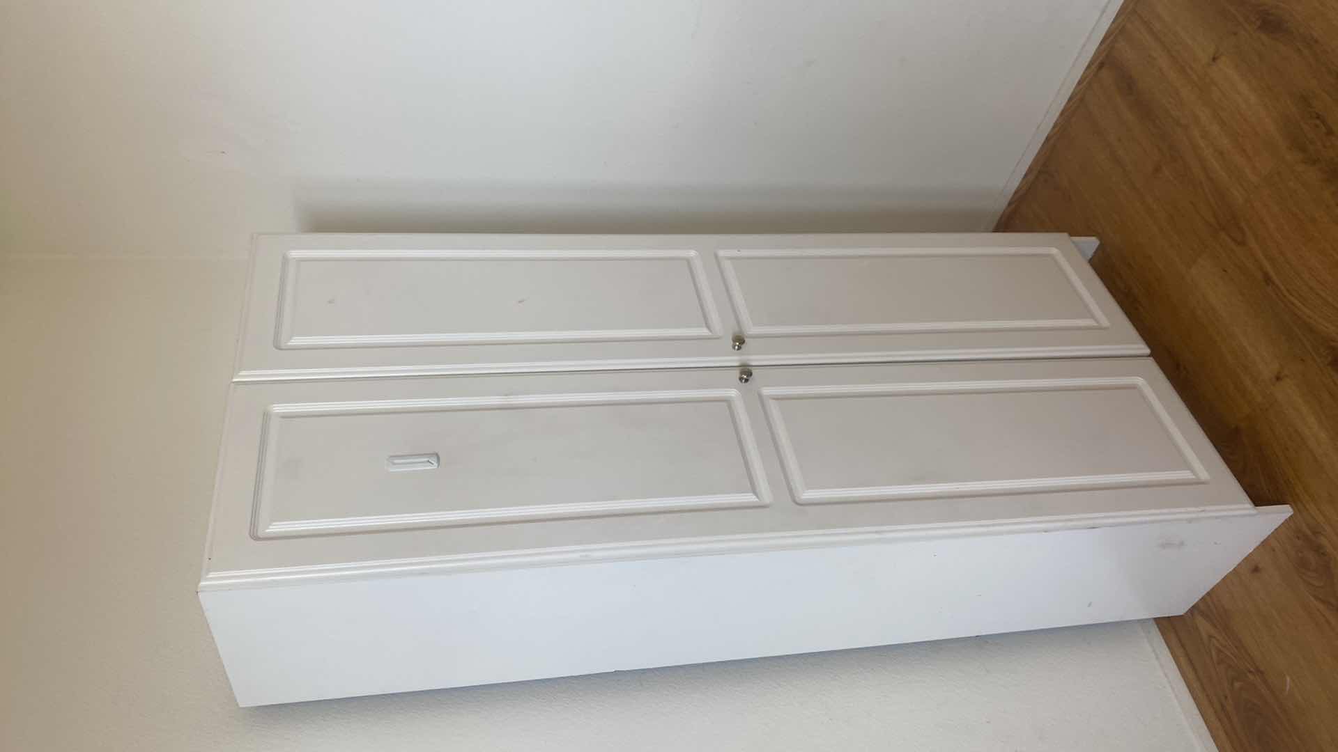 Photo 1 of WHITE TWO DOOR PRESSBOARD CABINET 30” x 15 1/2” H 72”