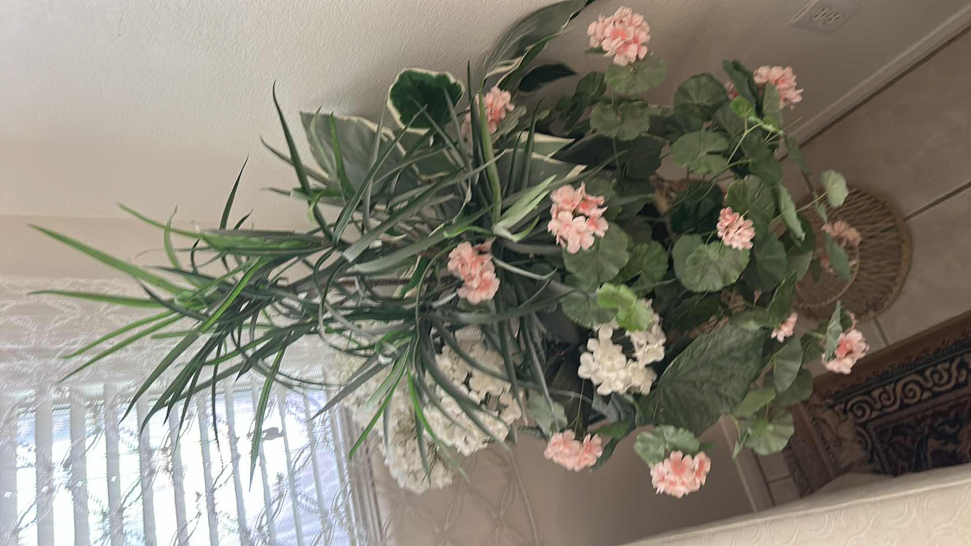 Photo 1 of FAUX FLORAL ARRANGEMENT IN WOVEN VASE H5’