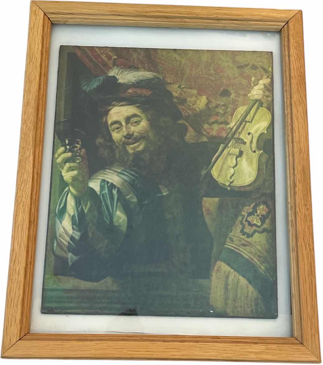 Photo 1 of VINTAGE FRAMED ARTWORK- The image shows a print of "The Merry Fiddler" by Gerard van Honthorst, painted in 1623. 11 1/2“ x H14 1/2“
