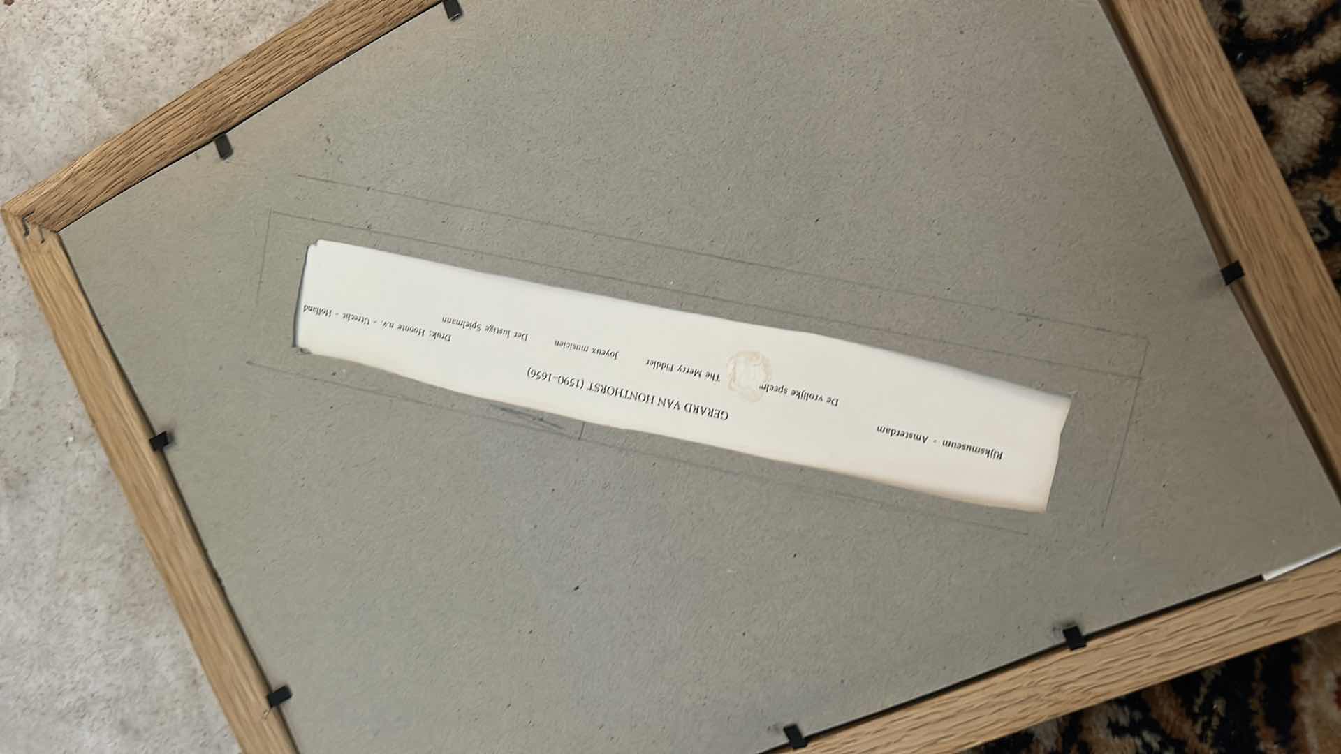 Photo 3 of VINTAGE FRAMED ARTWORK- The image shows a print of "The Merry Fiddler" by Gerard van Honthorst, painted in 1623. 11 1/2“ x H14 1/2“