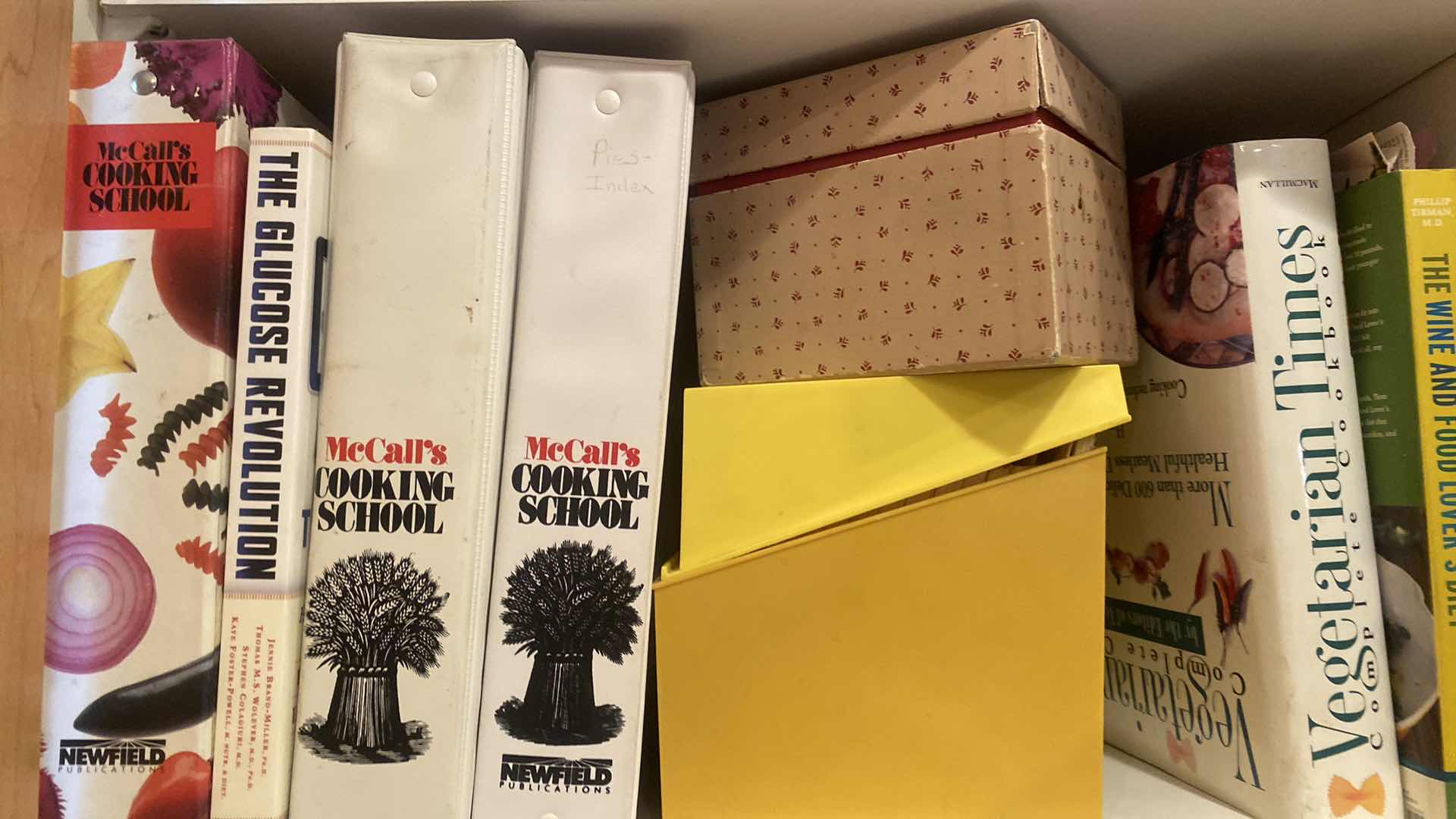 Photo 1 of CONTENTS OF KITCHEN CABINET -  COOK BOOKS & BAKEWARE