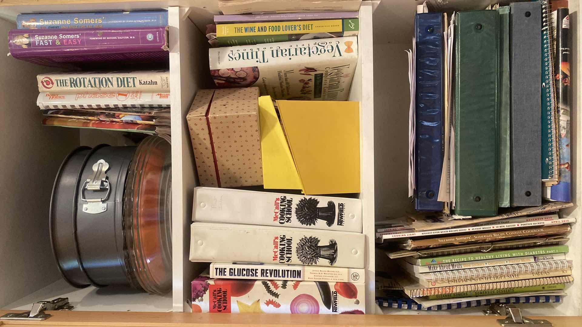 Photo 1 of CONTENTS OF KITCHEN CABINET -  COOK BOOKS & BAKEWARE