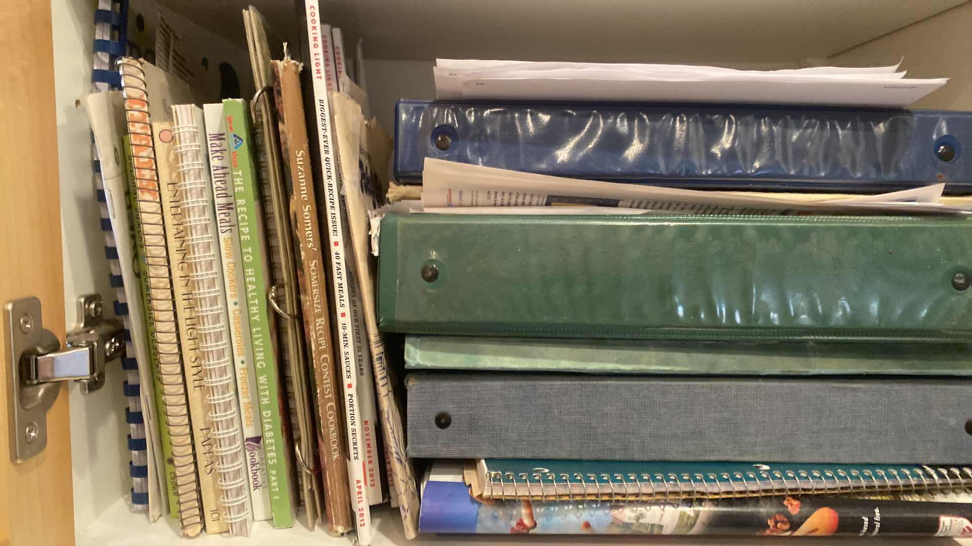 Photo 1 of CONTENTS OF KITCHEN CABINET -  COOK BOOKS & BAKEWARE