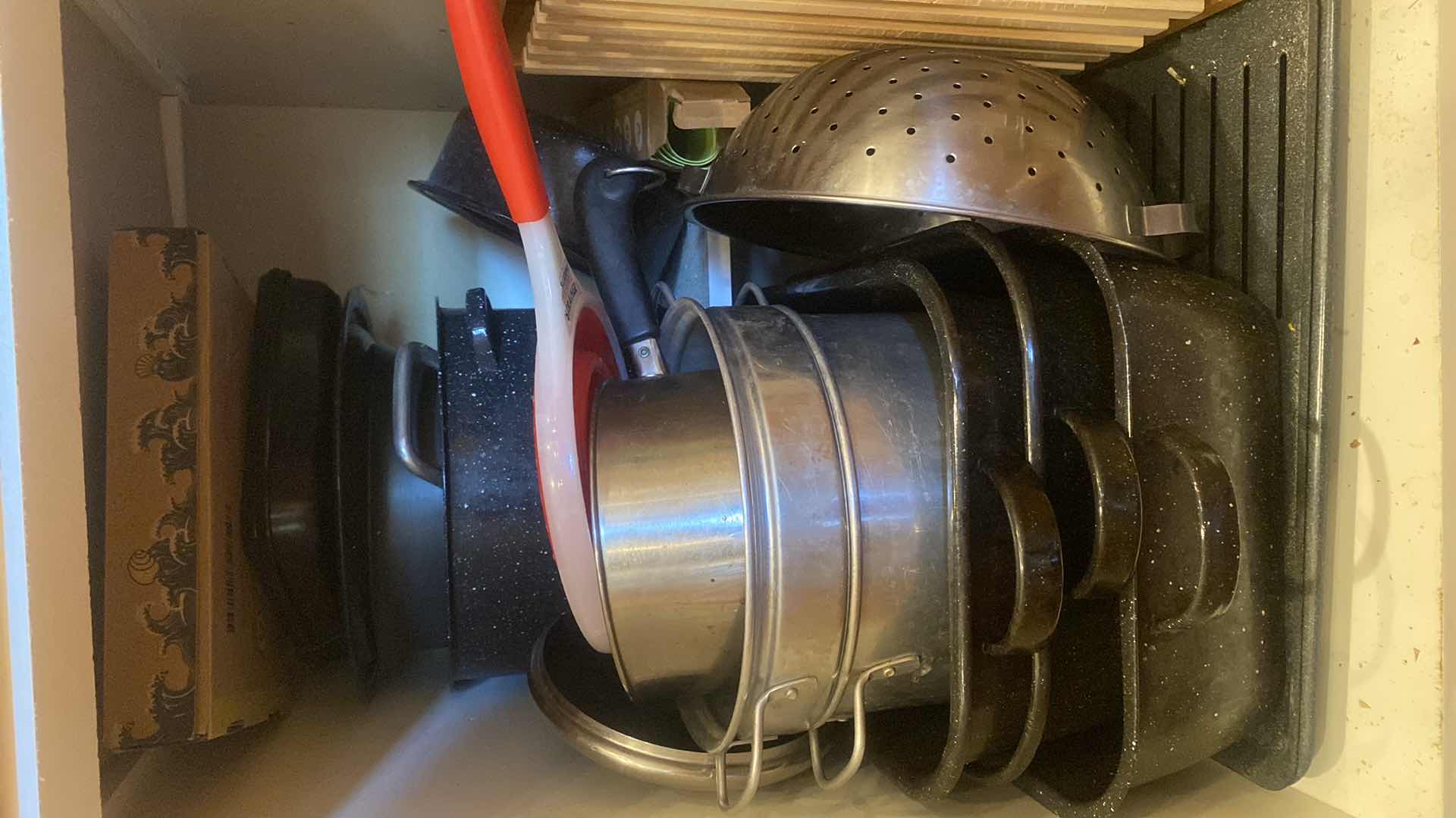 Photo 1 of CONTENTS OF KITCHEN CABINET - ROASTING PANS STOCK POTS & MORE