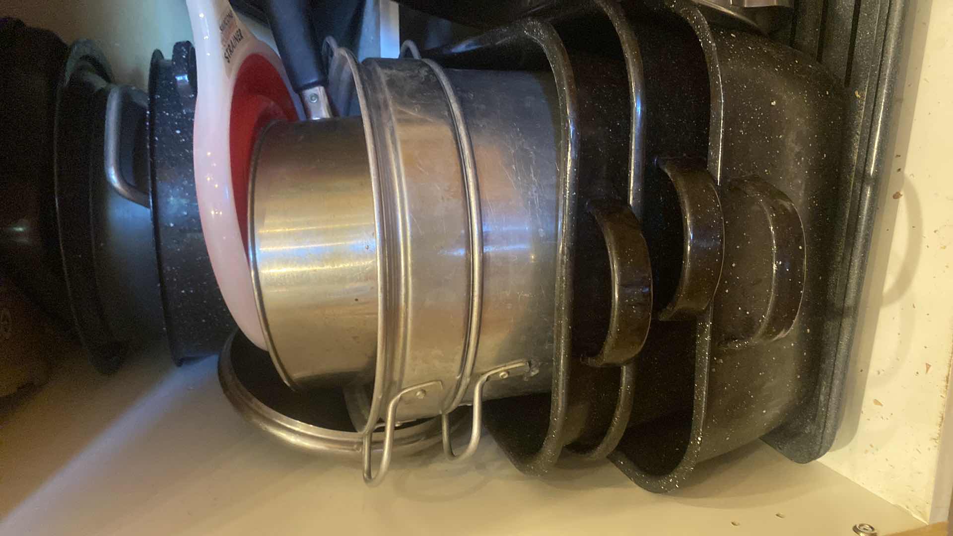 Photo 1 of CONTENTS OF KITCHEN CABINET - ROASTING PANS STOCK POTS & MORE