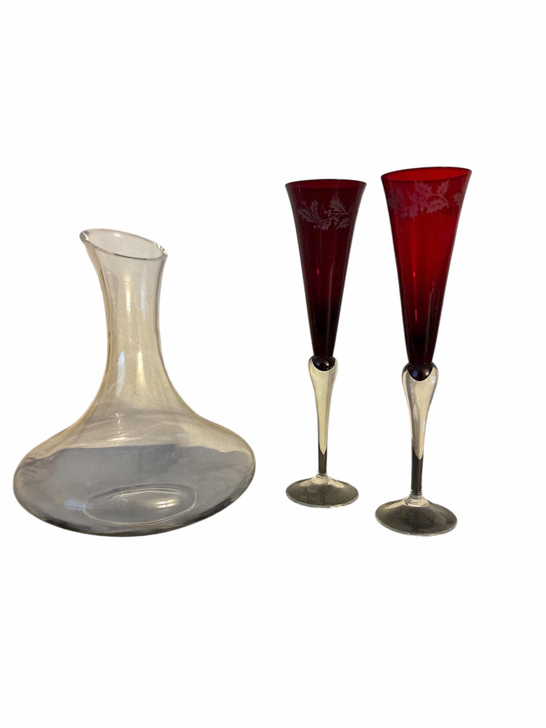 Photo 1 of CHRISTMAS FLUTES 11” AND GLASS DECANTER SMALL CHIP 9”x11”H
