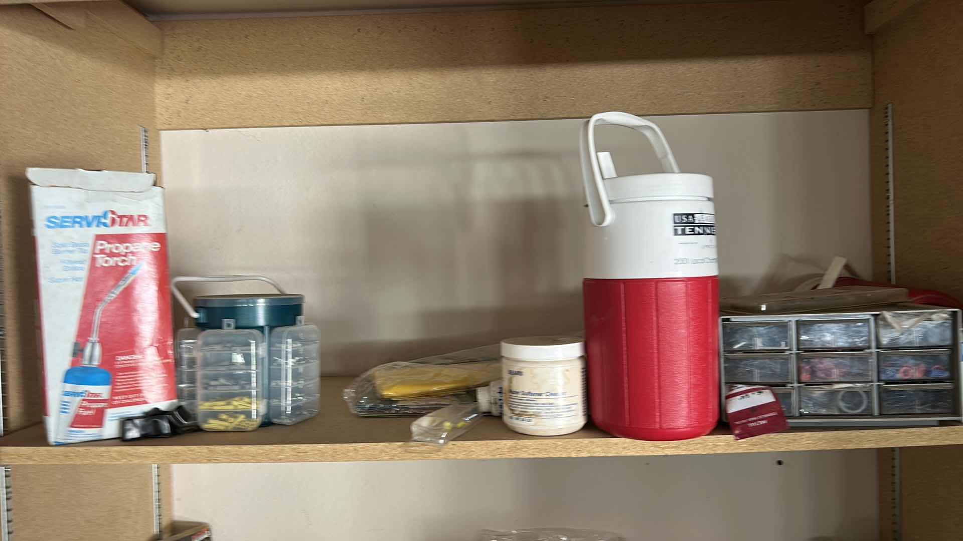 Photo 1 of CONTENTS OF CABINET IN GARAGE